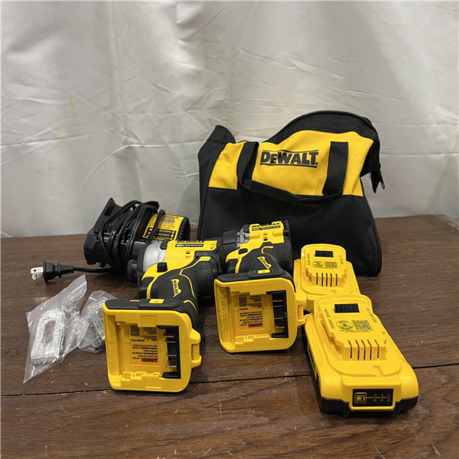 AS-ISDewalt DCK225D2 20V MAX ATOMIC Brushless Compact Lithium-Ion 1/2 in. Cordless Drill Driver and 1/4 in. Impact Driver Combo Kit with 2 Batteries 2 Ah