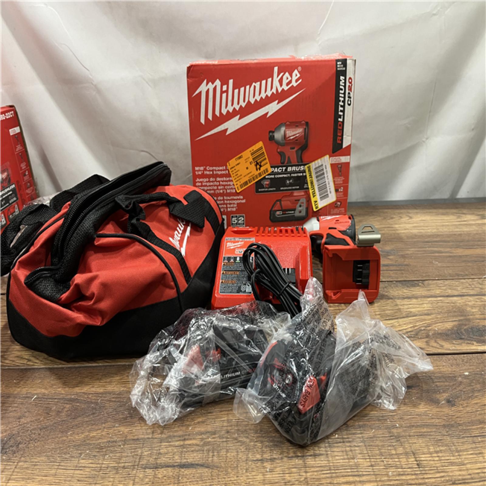 AS-IS Milwaukee M18 Compact Brushless 1/4  Hex Impact Driver Kit