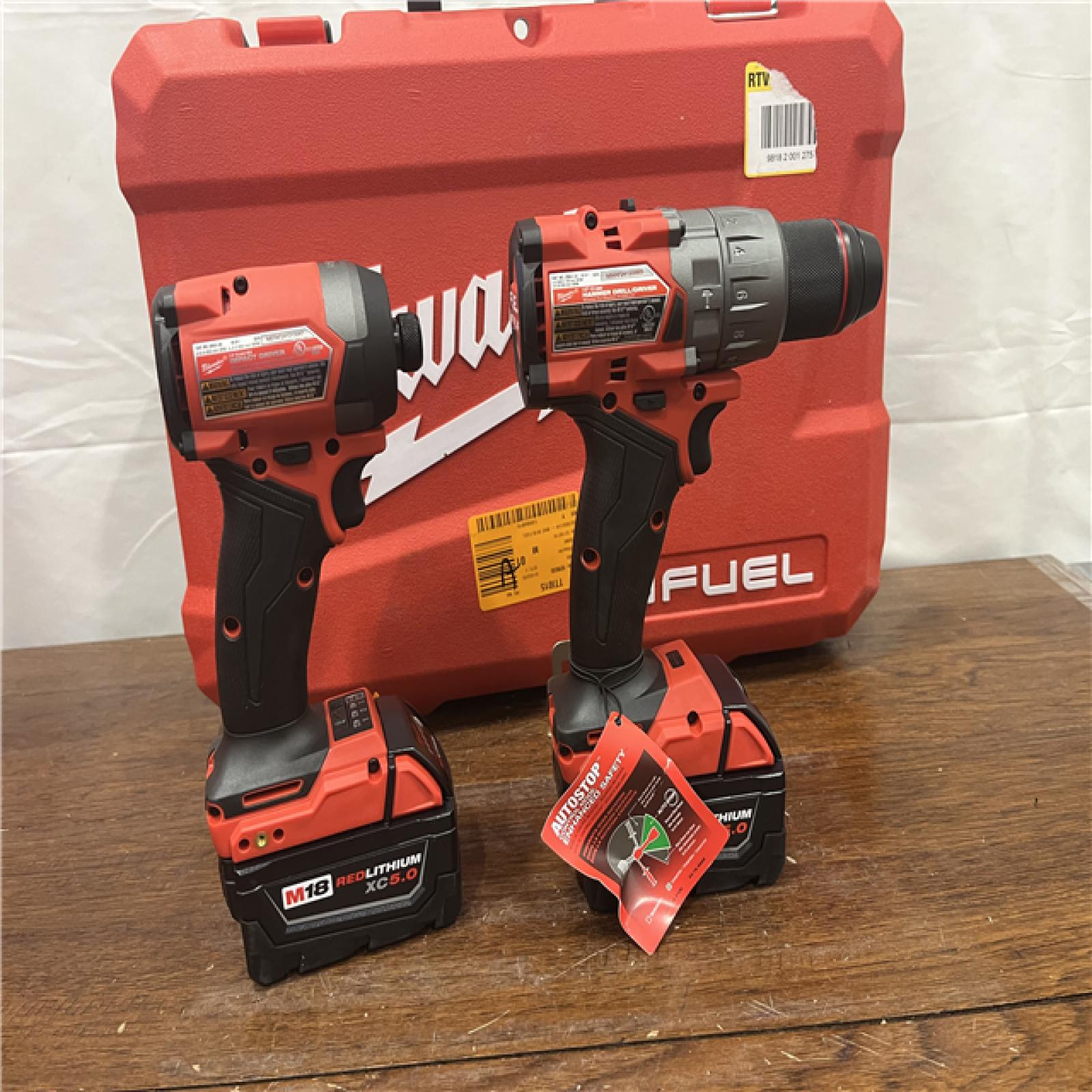 AS-IS Milwaukee M18 FUEL 18V Lithium-Ion Brushless Cordless Hammer Drill and Impact Driver Combo Kit (2-Tool) with 2 Batteries