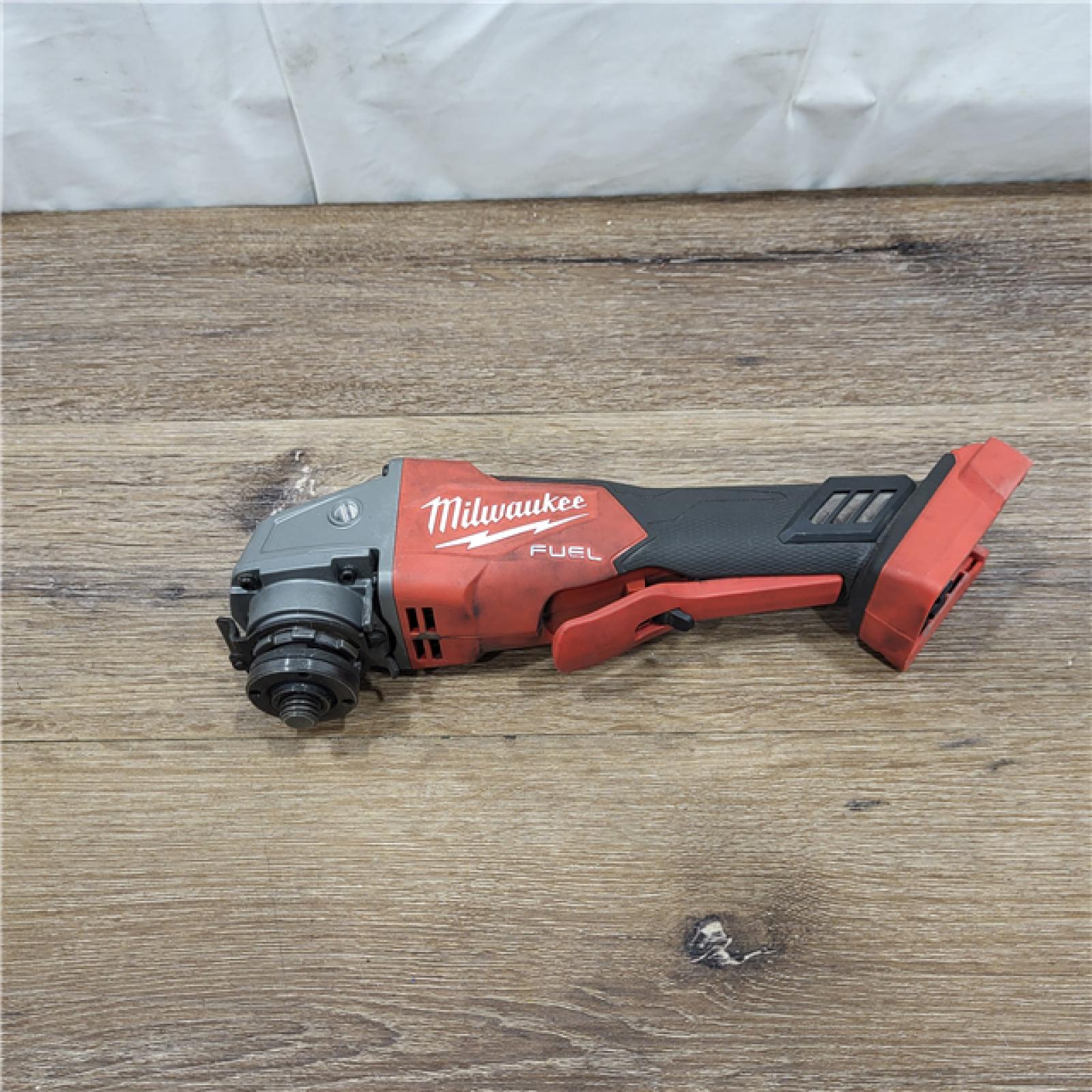 AS-IS Milwaukee 2880-20 M18 FUEL 18-Volt Lithium-Ion Brushless Cordless 4-1/2 in./5 in. Grinder W/Paddle Switch (Tool-Only)