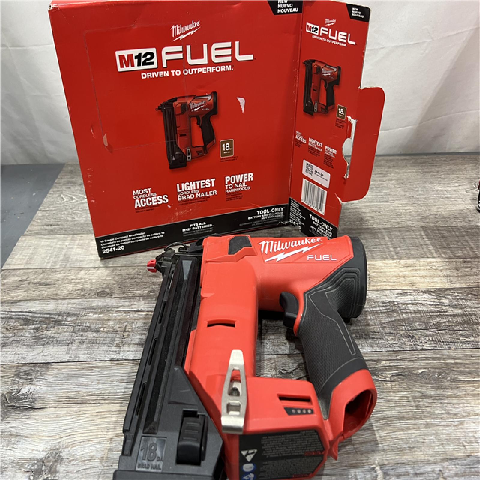 AS-IS MILWAUKEE M12 FUEL 12-Volt Lithium-Ion Brushless Cordless 18-Guage Compact Brad Nailer (Tool Only)