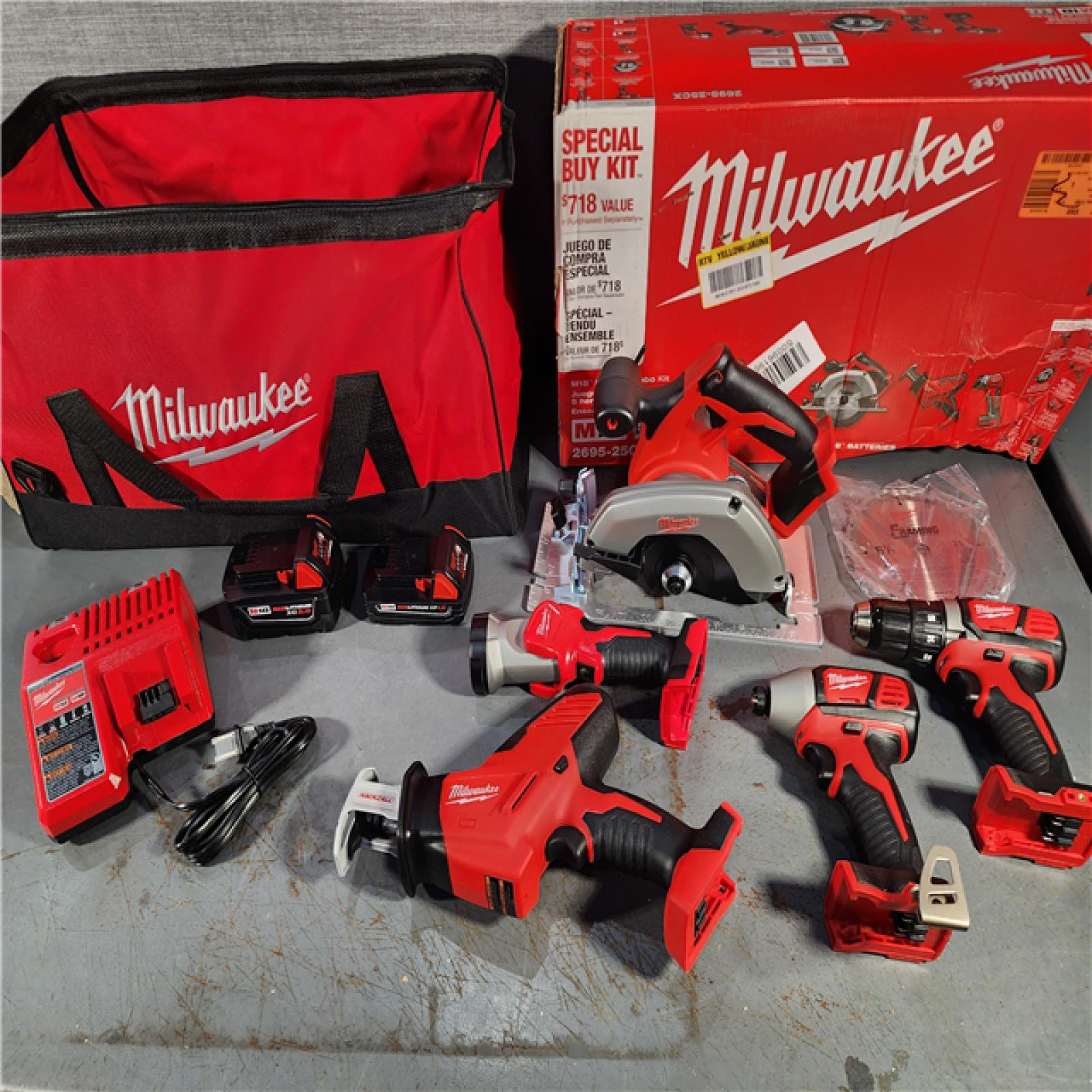 HOUSTON LOCATION - AS-IS (APPEARS LIKE NEW) Milwaukee M18 18-Volt Lithium-Ion Cordless Combo Tool Kit (5-Tool) with (1) 3.0Ah and (1) 1.5Ah Battery, (1) Charger, (1) Tool Bag