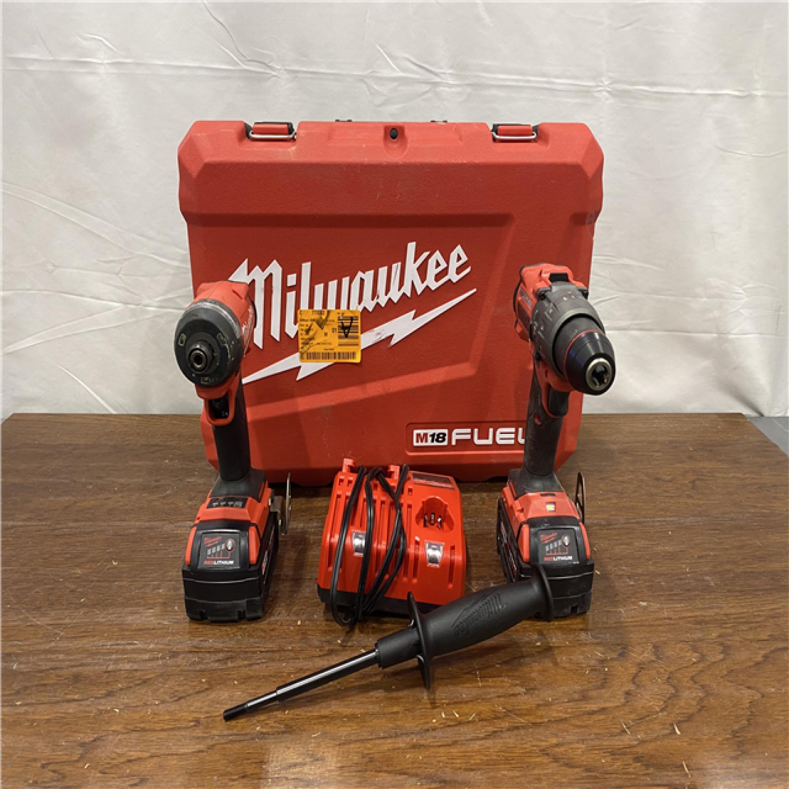 AS-IS Milwaukee M18 FUEL 18V Lithium-Ion Brushless Cordless Hammer Drill and Impact Driver Combo Kit (2-Tool) with 2 Batteries