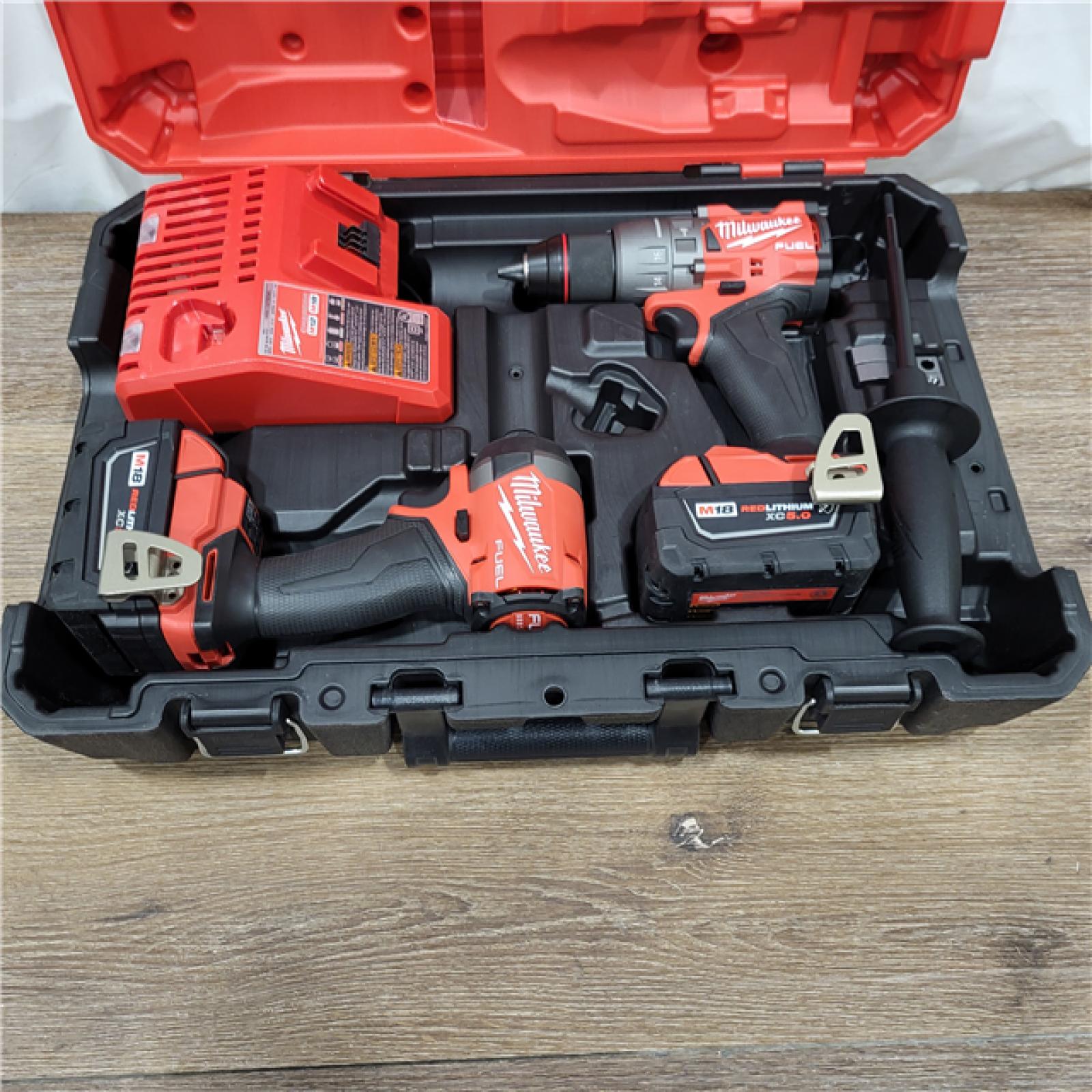 AS-IS M18 FUEL 18V Lithium-Ion Brushless Cordless Hammer Drill and Impact Driver Combo Kit (2-Tool) with 2 Batteries