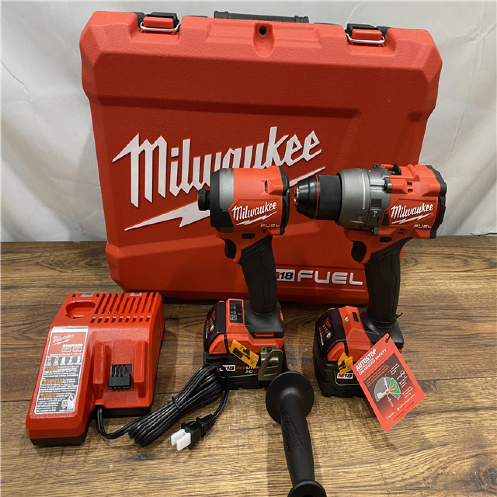 AS IS Milwaukee M18 FUEL 18V Lithium-Ion Brushless Cordless Hammer Drill and Impact Driver Combo Kit (2-Tool) with 2 Batteries