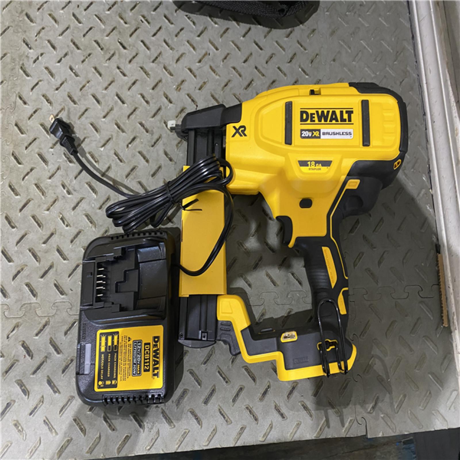 Houston location AS-IS DEWALT New in Box DEWALT DCN681D1 20V 18Ga Stapler Kit NO BATTERY