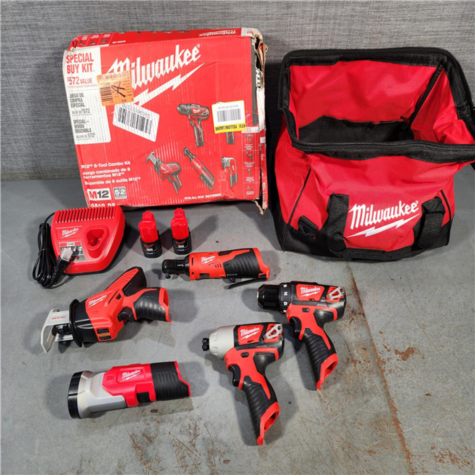 HOUSTON LOCATION - AS-IS (APPEARS LIKE NEW) MILWAUKEE M12 12V Lithium-Ion Cordless Combo Kit (5-Tool) with Two 1.5Ah Batteries, Charger & Tool Bag