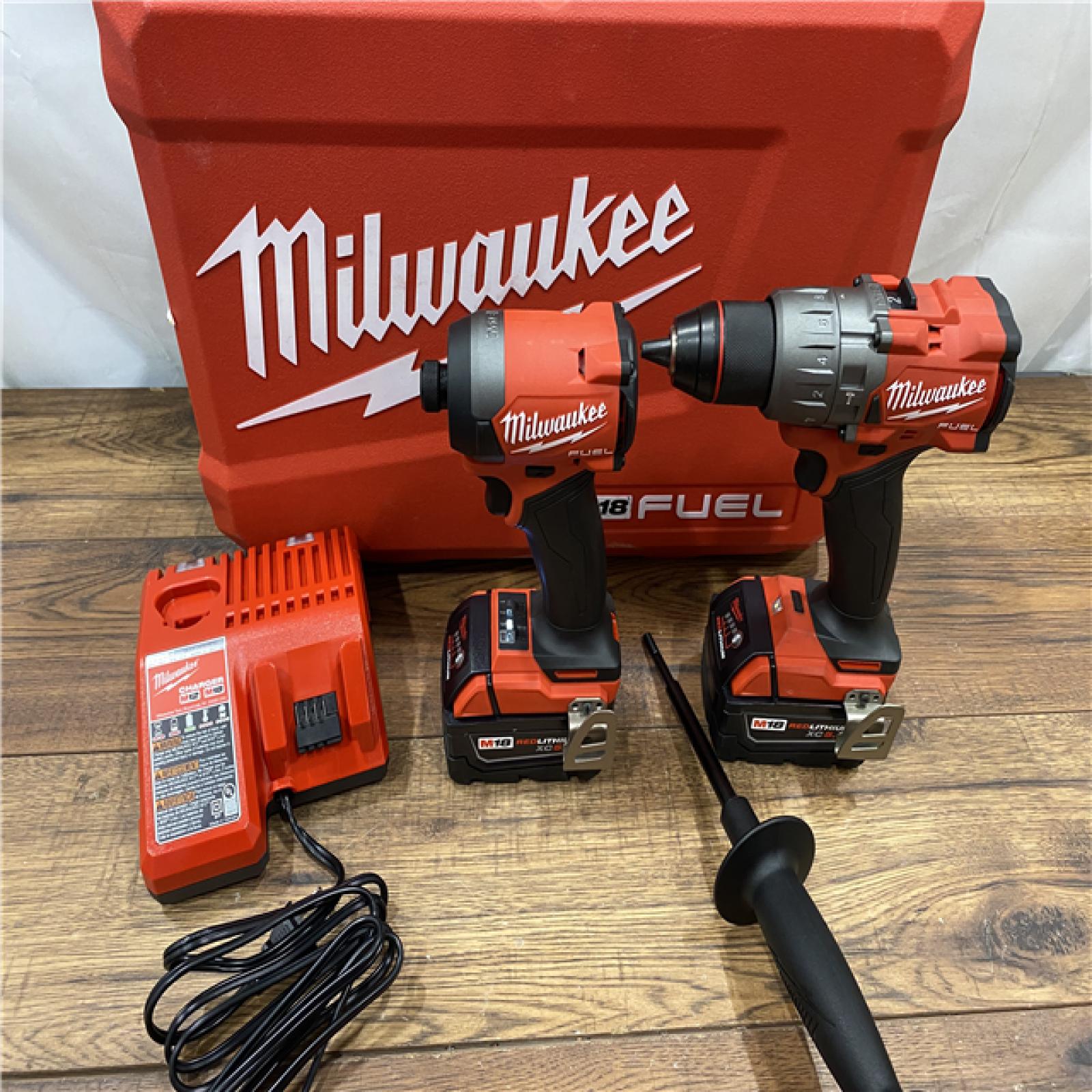 AS IS Milwaukee M18 FUEL 18V Lithium-Ion Brushless Cordless Hammer Drill and Impact Driver Combo Kit (2-Tool) with 2 Batteries