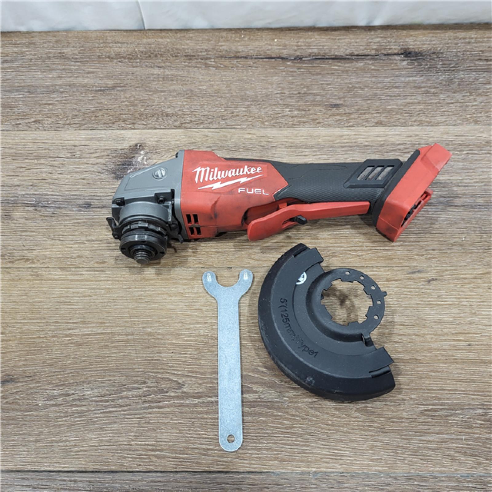 AS-IS Milwaukee 2880-20 M18 FUEL 18-Volt Lithium-Ion Brushless Cordless 4-1/2 in./5 in. Grinder W/Paddle Switch (Tool-Only)