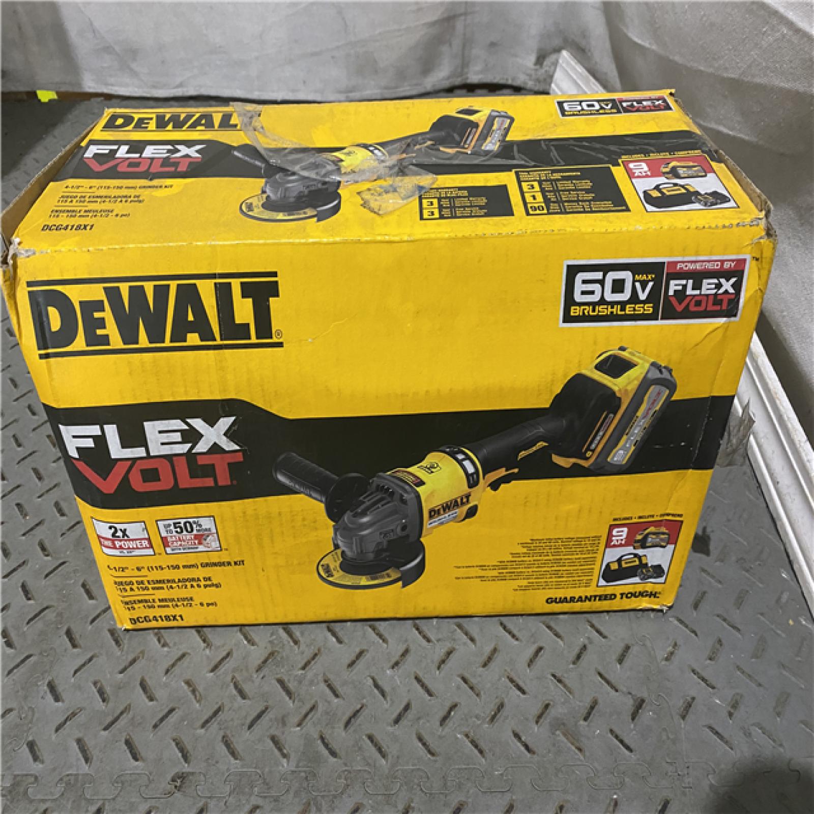 Houston location AS-IS DEWALT FLEXVOLT 60-Volt MAX Brushless 4-1/2 in. - 6 in. Cordless Grinder with Kickback Brake Kit (D)