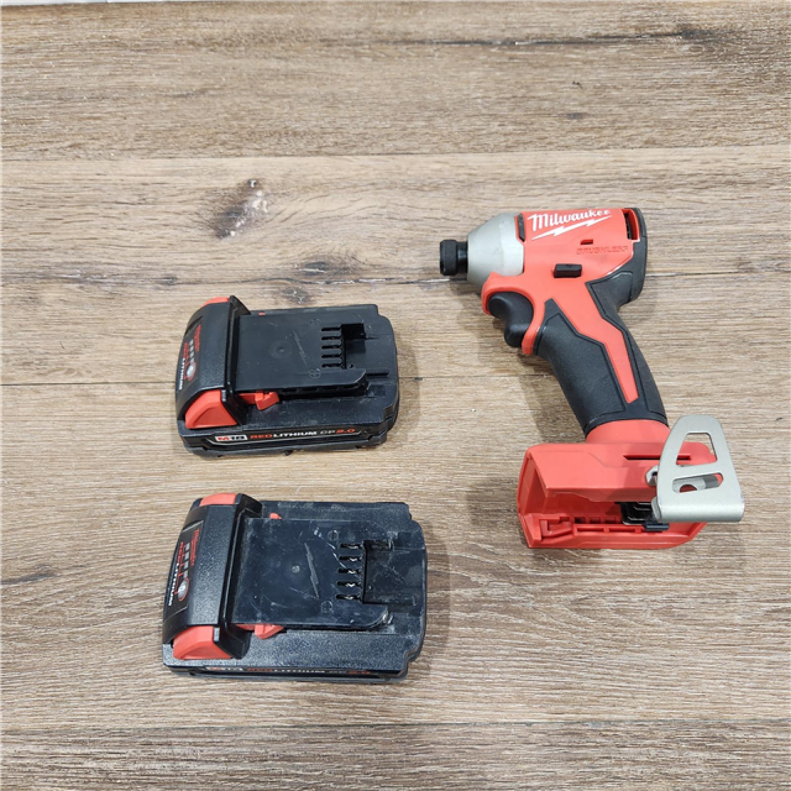 AS-IS M18 18V Lithium-Ion Brushless Cordless 1/4 in. Impact Driver Kit with Two 2.0 Ah Batteries and Charger