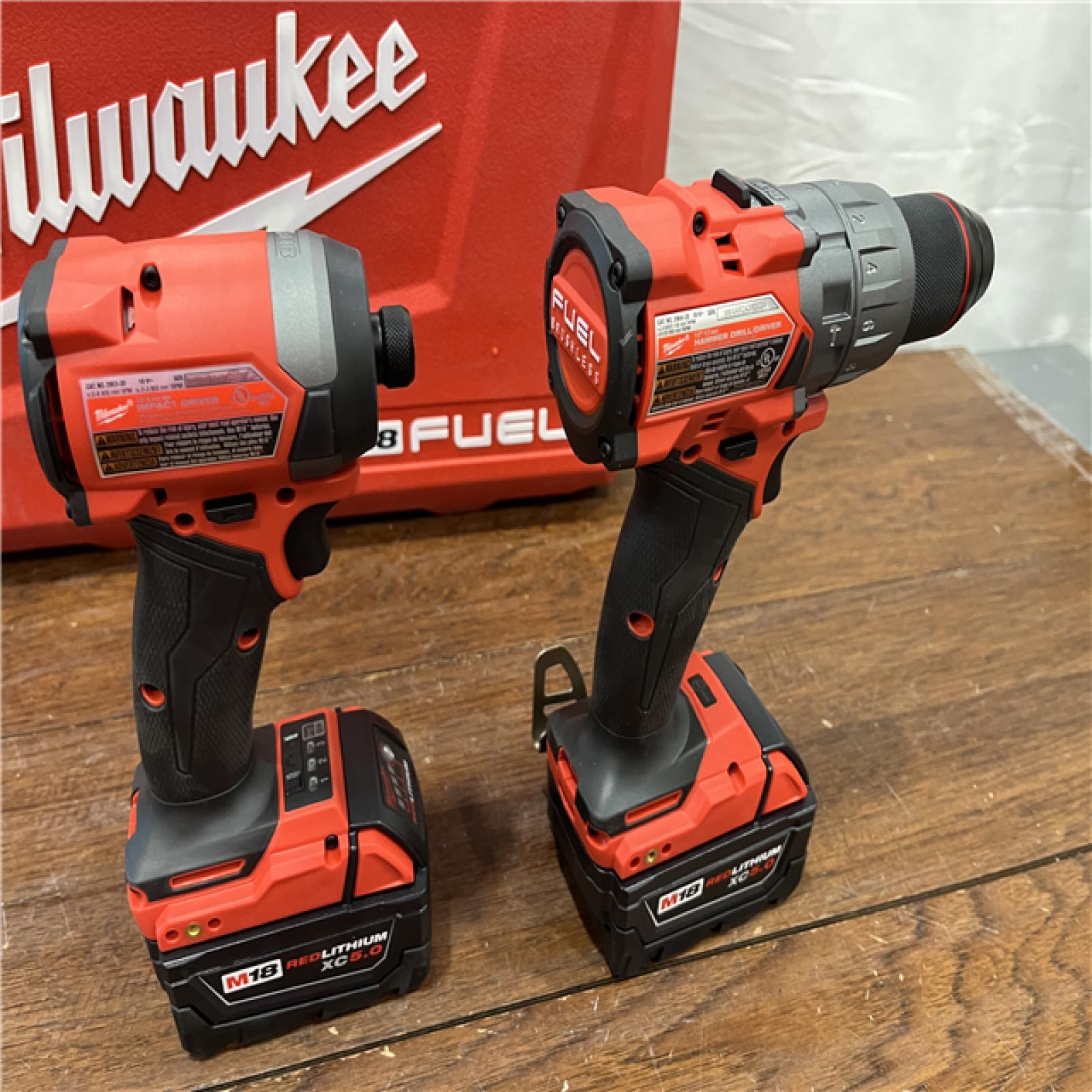 AS-ISMilwaukee M18 FUEL 18V Lithium-Ion Brushless Cordless Hammer Drill and Impact Driver Combo Kit (2-Tool) with 2 Batteries