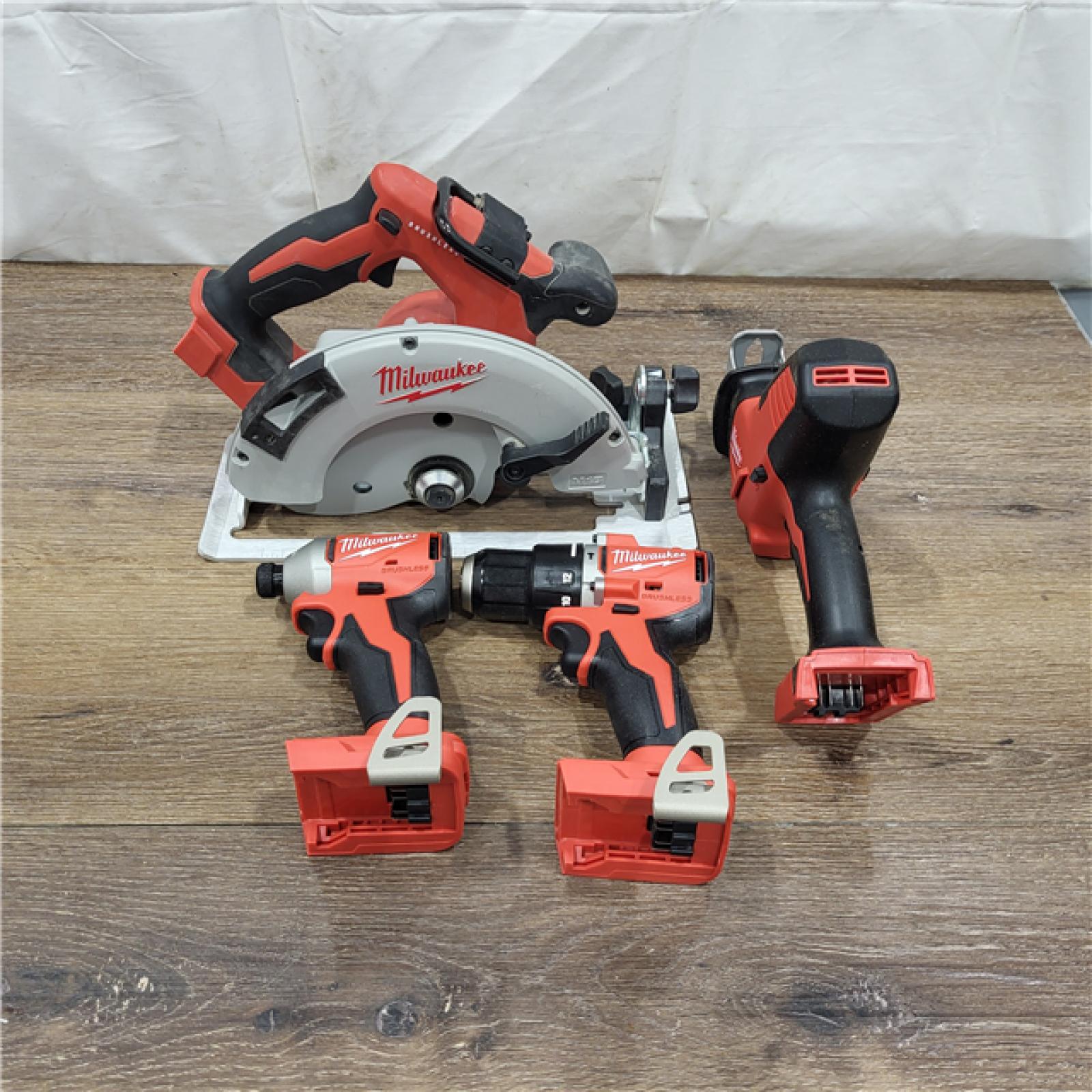 AS-IS Milwaukee M18 18-Volt Lithium-Ion Brushless Cordless Combo Kit (4-Tool) with 2-Batteries, 1-Charger and Tool Bag