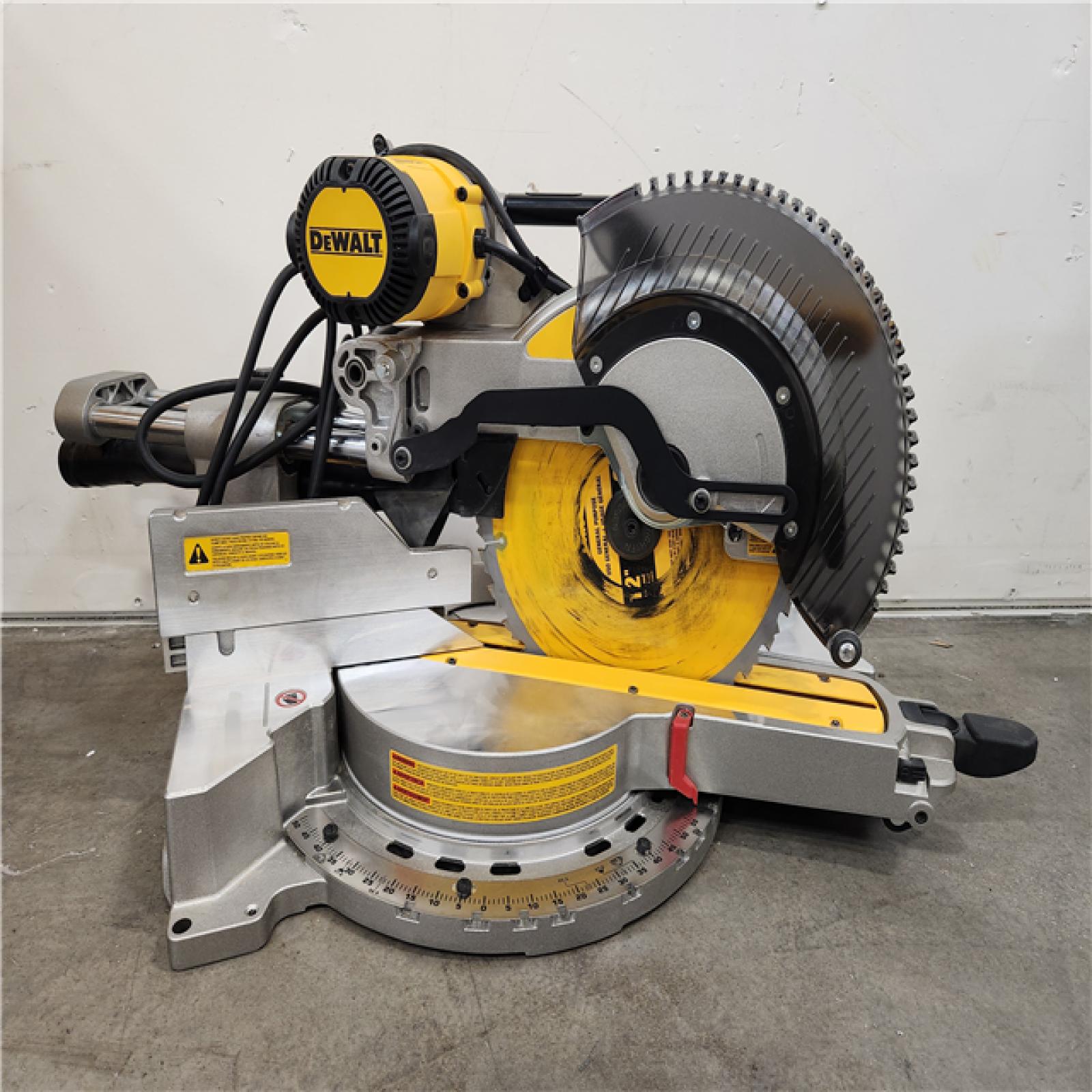 Phoenix Location NEW DEWALT 15 Amp Corded 12 in. Double Bevel Sliding Compound Miter Saw, Blade Wrench and Material Clamp