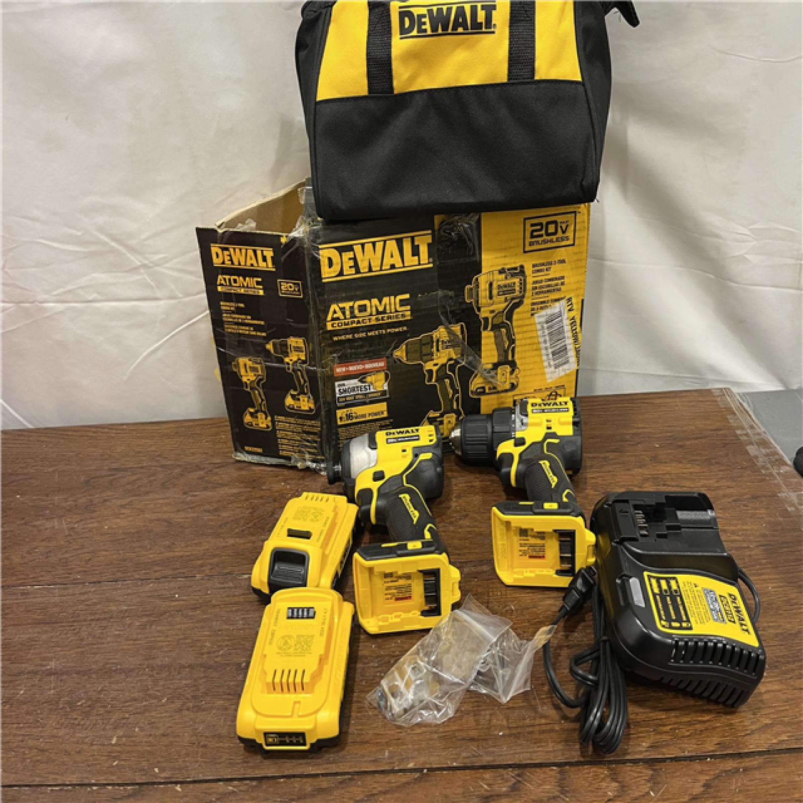 AS-ISDewalt DCK225D2 20V MAX ATOMIC Brushless Compact Lithium-Ion 1/2 in. Cordless Drill Driver and 1/4 in. Impact Driver Combo Kit with 2 Batteries 2 Ah