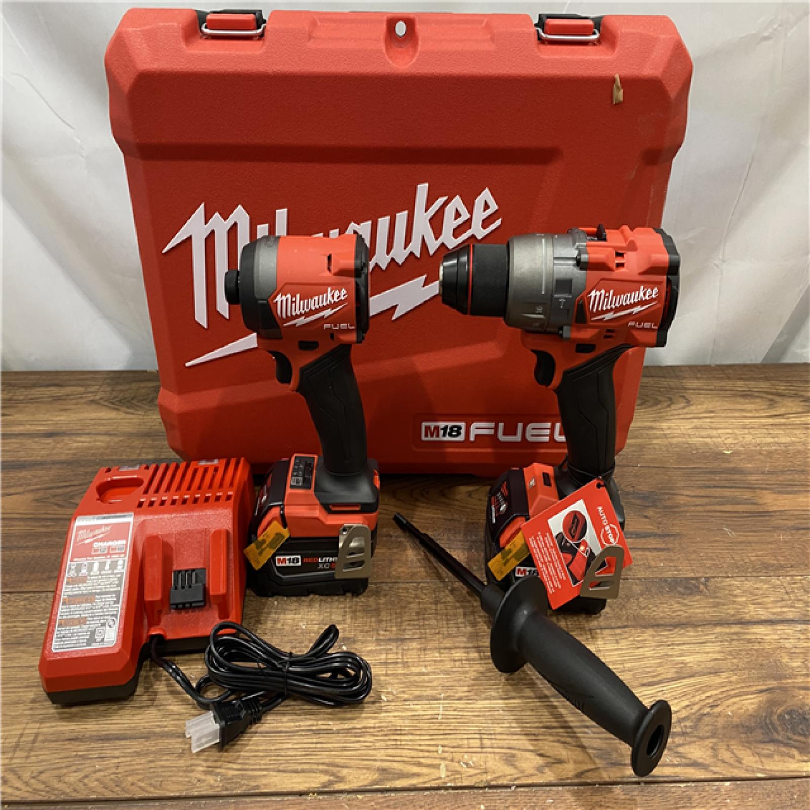 AS IS Milwaukee M18 FUEL 18V Lithium-Ion Brushless Cordless Hammer Drill and Impact Driver Combo Kit (2-Tool) with 2 Batteries