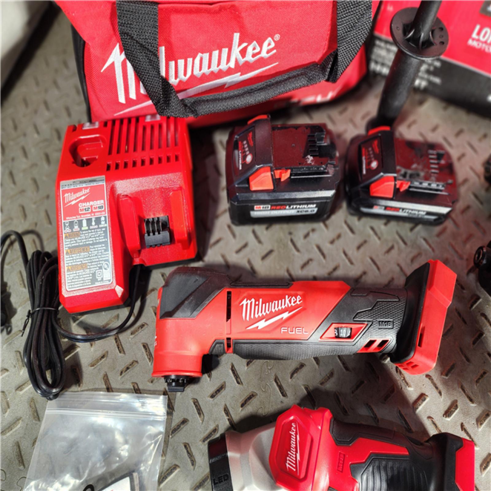 HOUSTON LOCATION - AS-IS Milwaukee 3698-24MT 18V Fuel 4-Tool Cordless Combo Kit with 6.0Ah 3.0Ah Lithium Ion Batteries