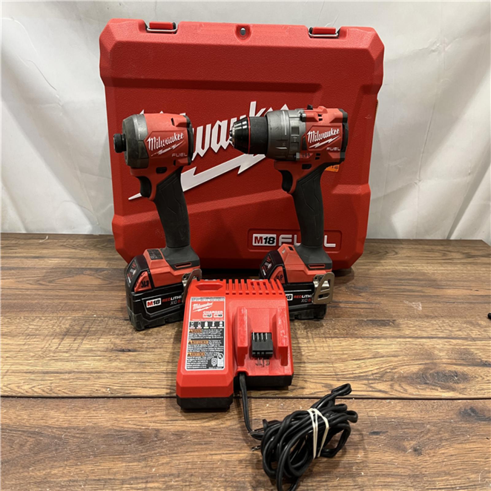 AS-IS Milwaukee M18 FUEL 18V Lithium-Ion Brushless Cordless Hammer Drill and Impact Driver Combo Kit (2-Tool) with 2 Batteries