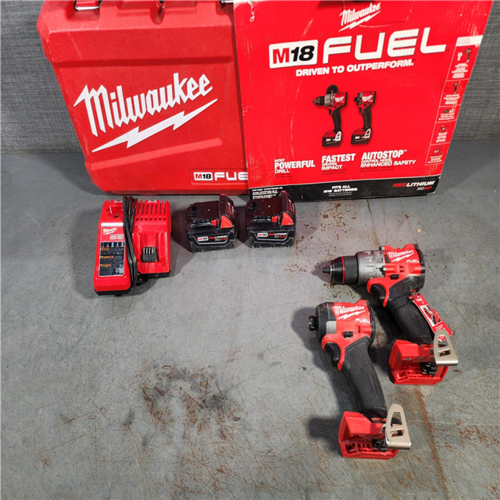 HOUSTON LOCATION - AS-IS Milwaukee M18 FUEL 18V Lithium-Ion Brushless Cordless Hammer Drill and Impact Driver Combo Kit (2-Tool) with 2 Batteries