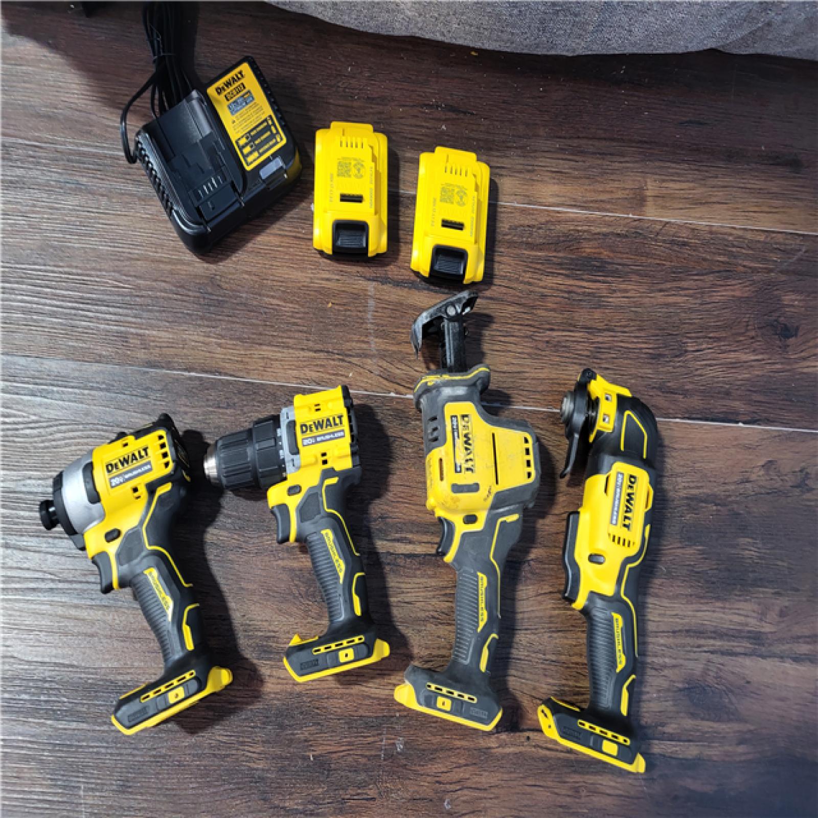 CALIFORNIA AS-IS DEWALT BRUSHLESS 4-TOOL COMBO KIT(BATTERIES,CHARGER,AND BAG INCLUDED)