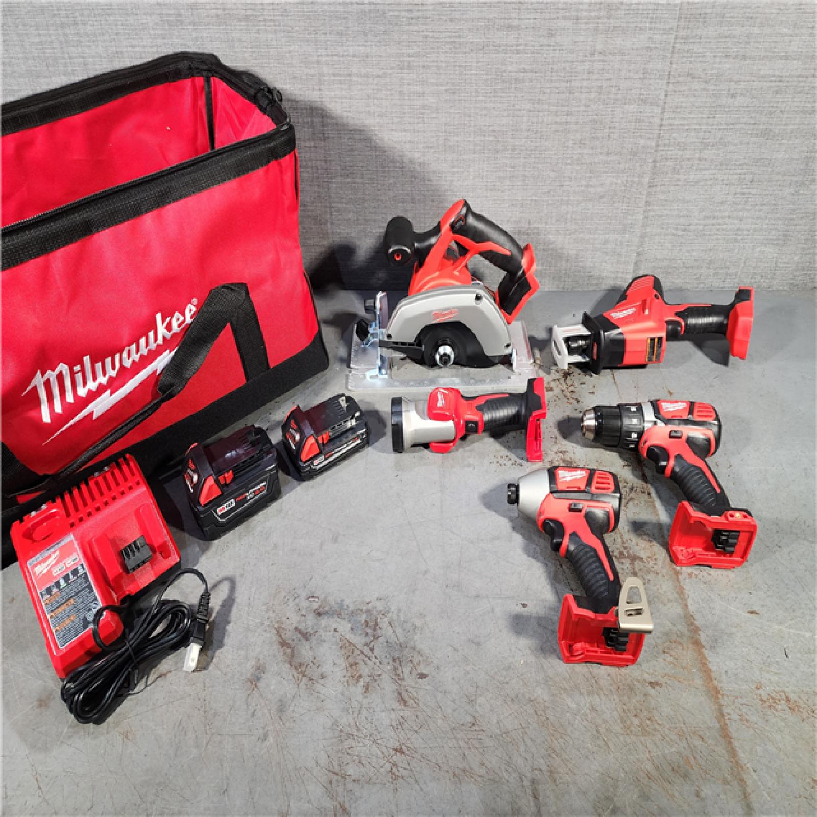 HOUSTON LOCATION - AS-IS (APPEARS LIKE NEW) M18 18V Lithium-Ion Cordless Combo Kit (5-Tool) with (1) 3.0Ah and (1) 1.5Ah Battery, (1) Charger, (1) Tool Bag