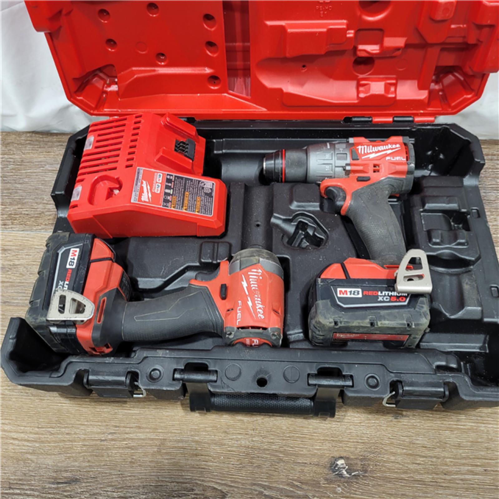 AS-IS M18 FUEL 18V Lithium-Ion Brushless Cordless Hammer Drill and Impact Driver Combo Kit (2-Tool) with 2 Batteries