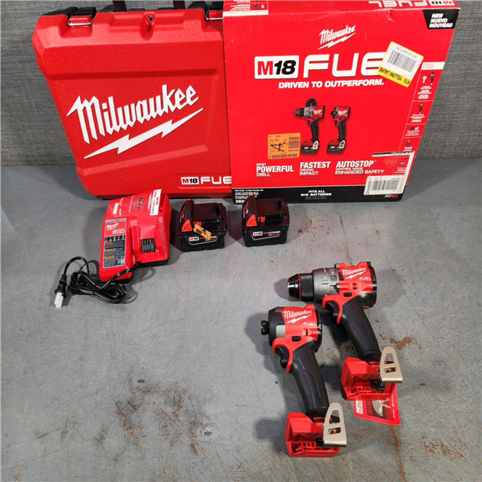 HOUSTON LOCATION - AS-IS (APPEARS LIKE NEW) Milwaukee M18 FUEL 18V Lithium-Ion Brushless Cordless Hammer Drill and Impact Driver Combo Kit (2-Tool) with 2 Batteries