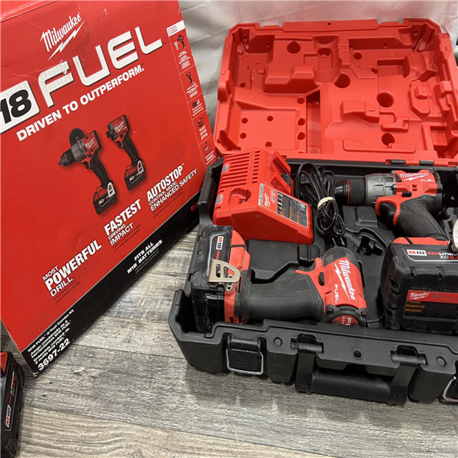 AS-IS MILWAUKEE M18 FUEL 18V Lithium-Ion Brushless Cordless Hammer Drill and Impact Driver Combo Kit (2-Tool) with 2 Batteries