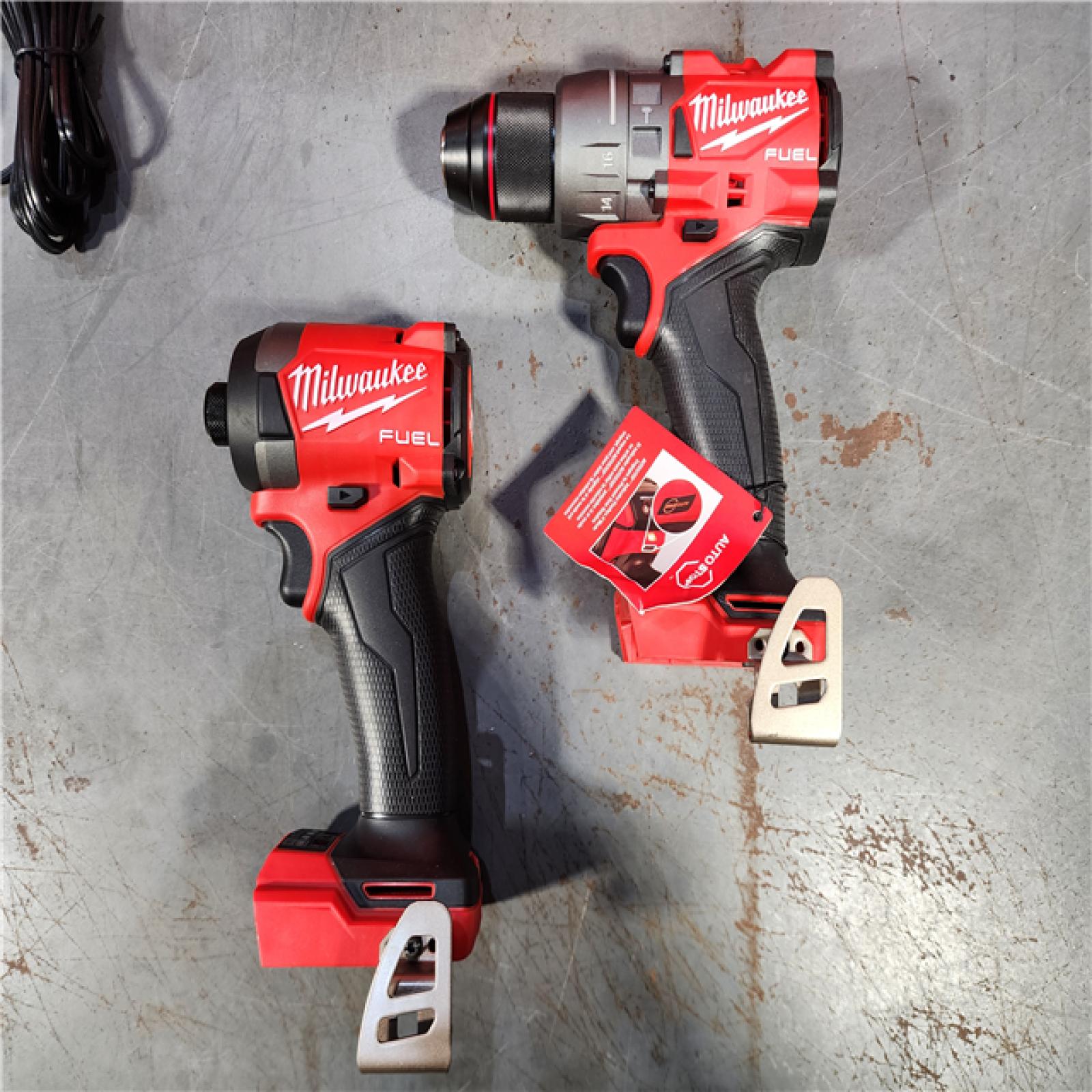 HOUSTON LOCATION - AS-IS (APPEARS LIKE NEW) Milwaukee M18 FUEL 18V Lithium-Ion Brushless Cordless Hammer Drill and Impact Driver Combo Kit (2-Tool) with 2 Batteries