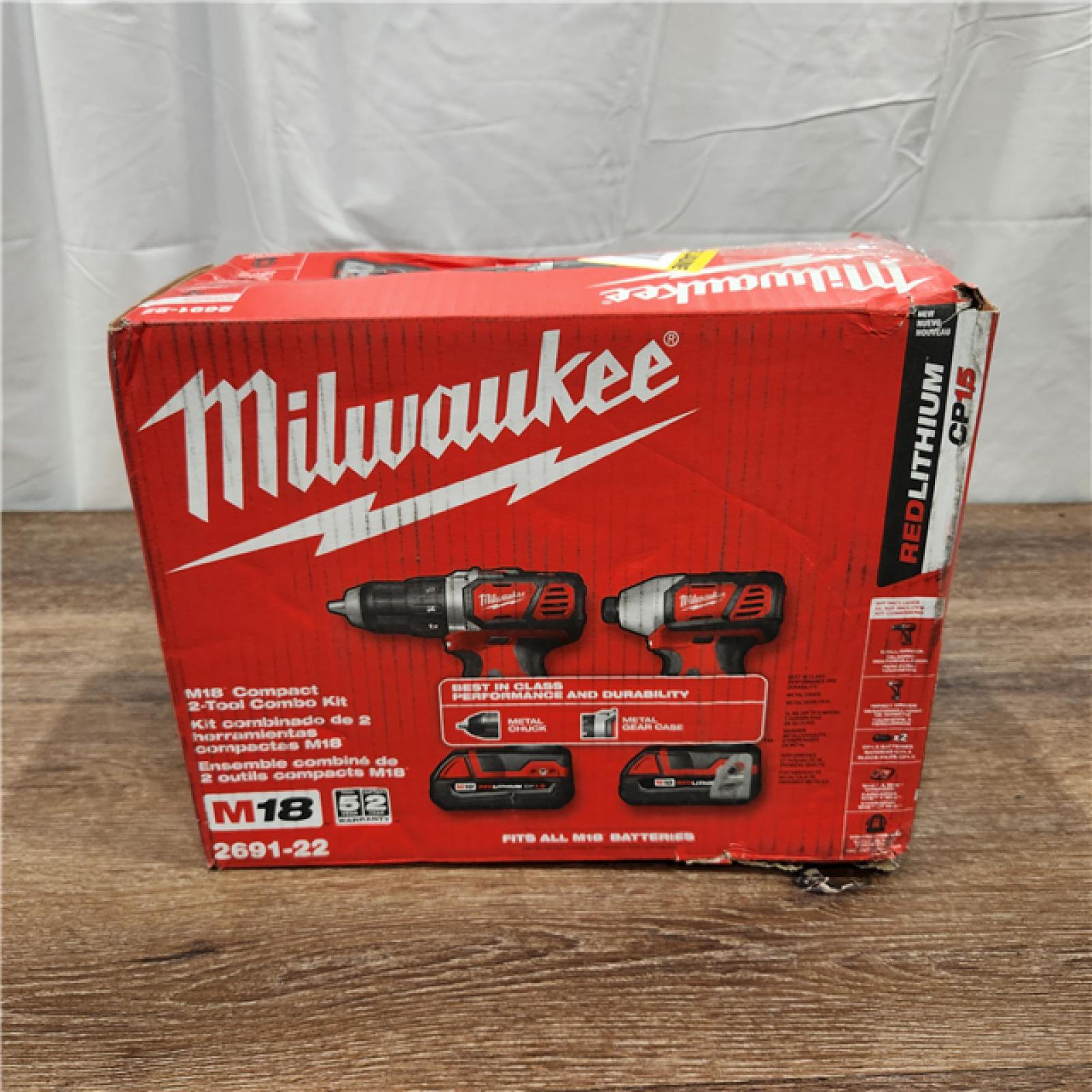 AS-IS Milwaukee M18 Brushed Cordless (2-Tool) Drill/Driver and Impact Driver Kit