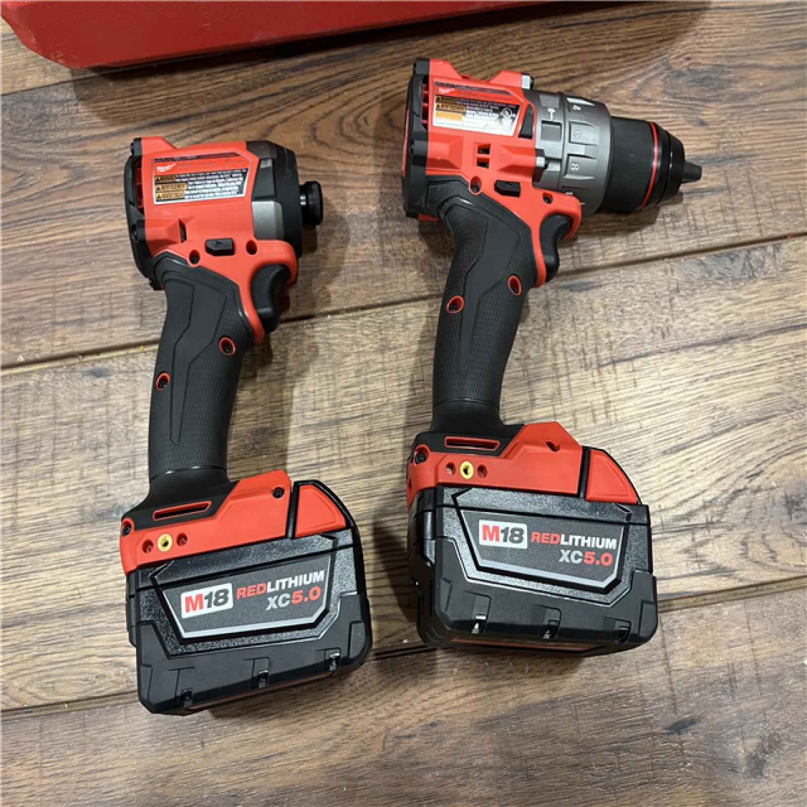 AS-IS Milwaukee M18 FUEL 18V Lithium-Ion Brushless Cordless Hammer Drill and Impact Driver Combo Kit (2-Tool) with 2 Batteries