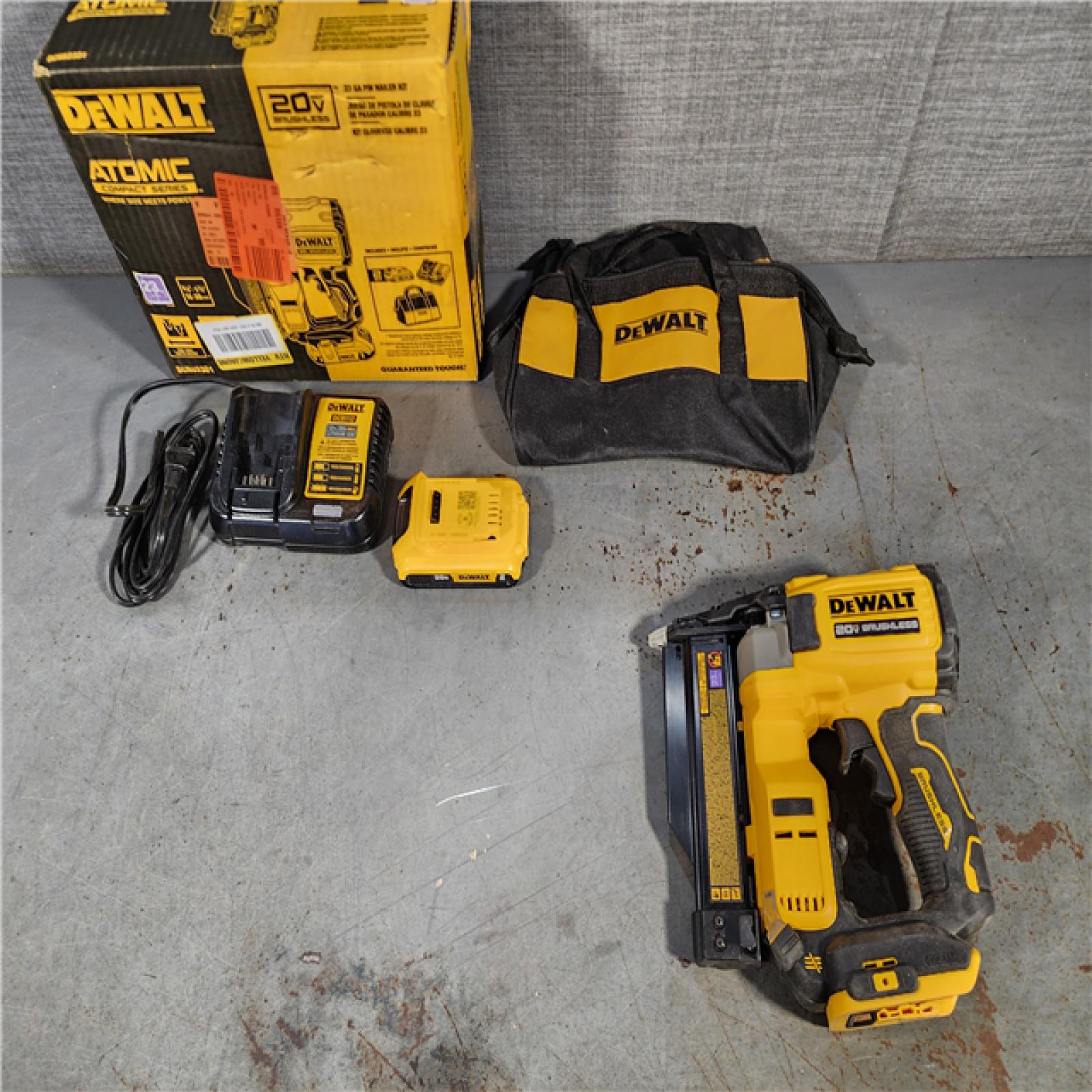 HOUSTON LOCATION - AS-IS DEWALT ATOMIC 20V MAX Lithium Ion Cordless 23 Gauge Pin Nailer Kit with 3.0Ah Battery and Charger