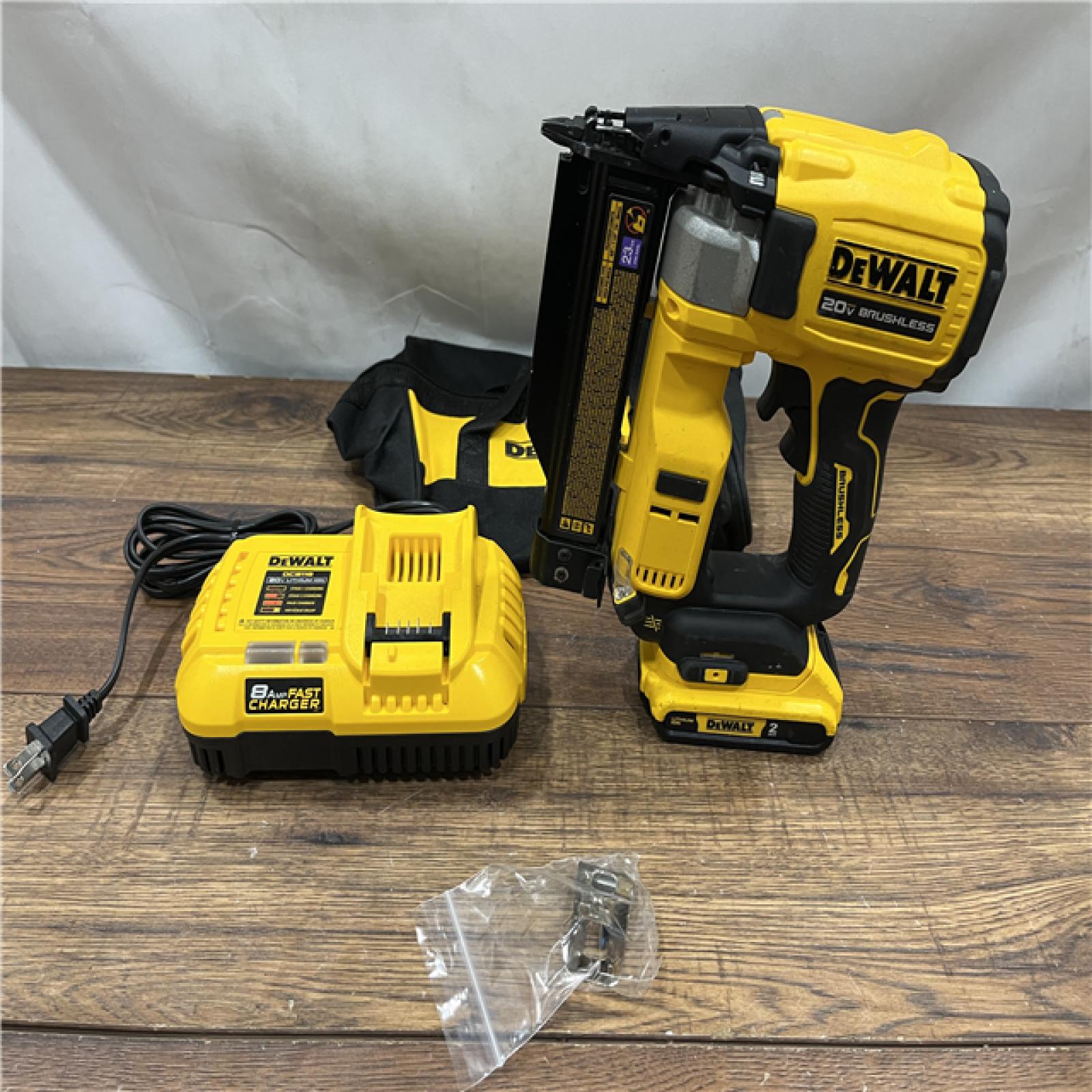 AS IS DEWALT ATOMIC 20V MAX Lithium Ion Cordless 23 Gauge Pin Nailer Kit with 3.0Ah Battery and Charger