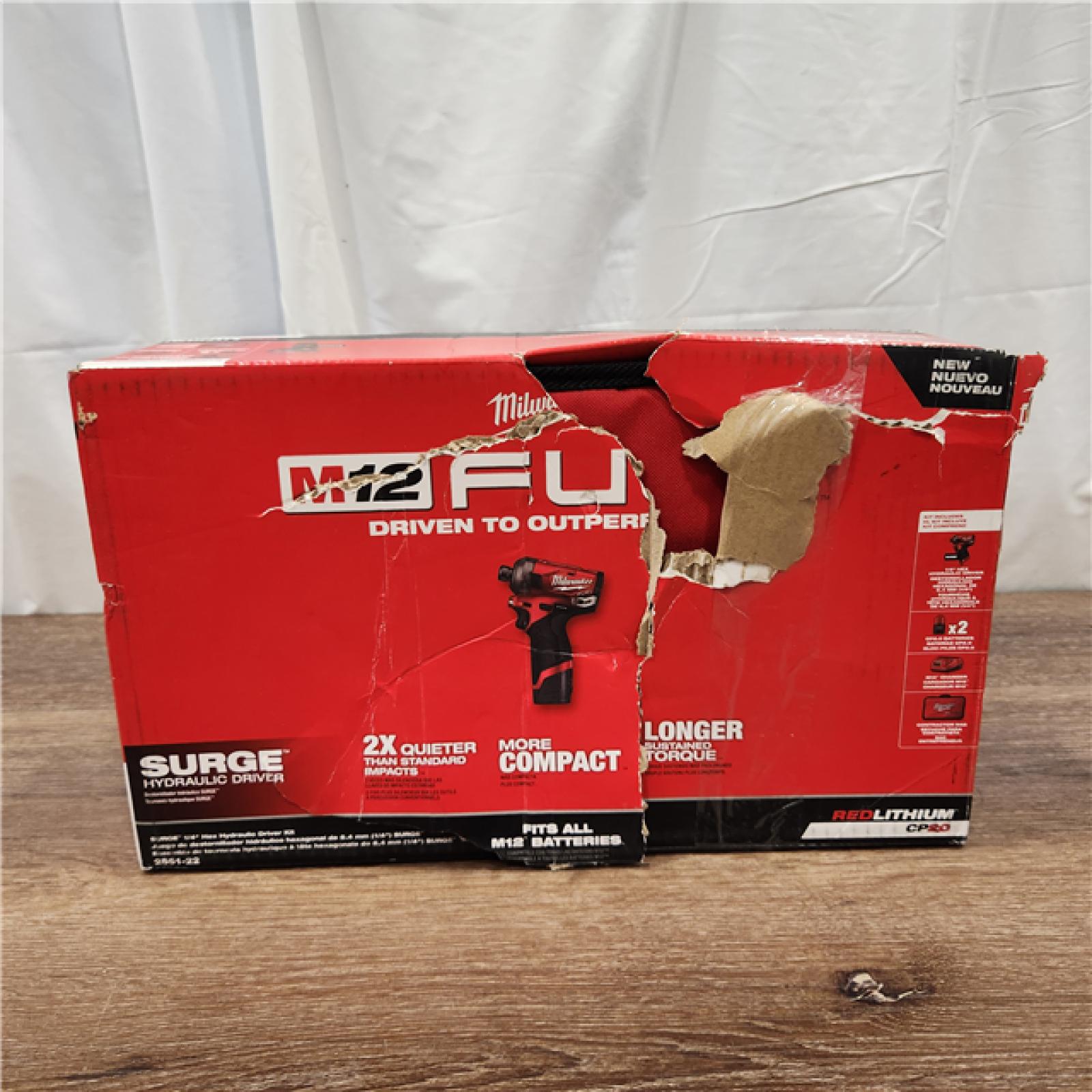 AS-IS M12 FUEL SURGE 12V Lithium-Ion Brushless Cordless 1/4 in. Hex Impact Driver Compact Kit W/Two 2.0Ah Batteries, Bag