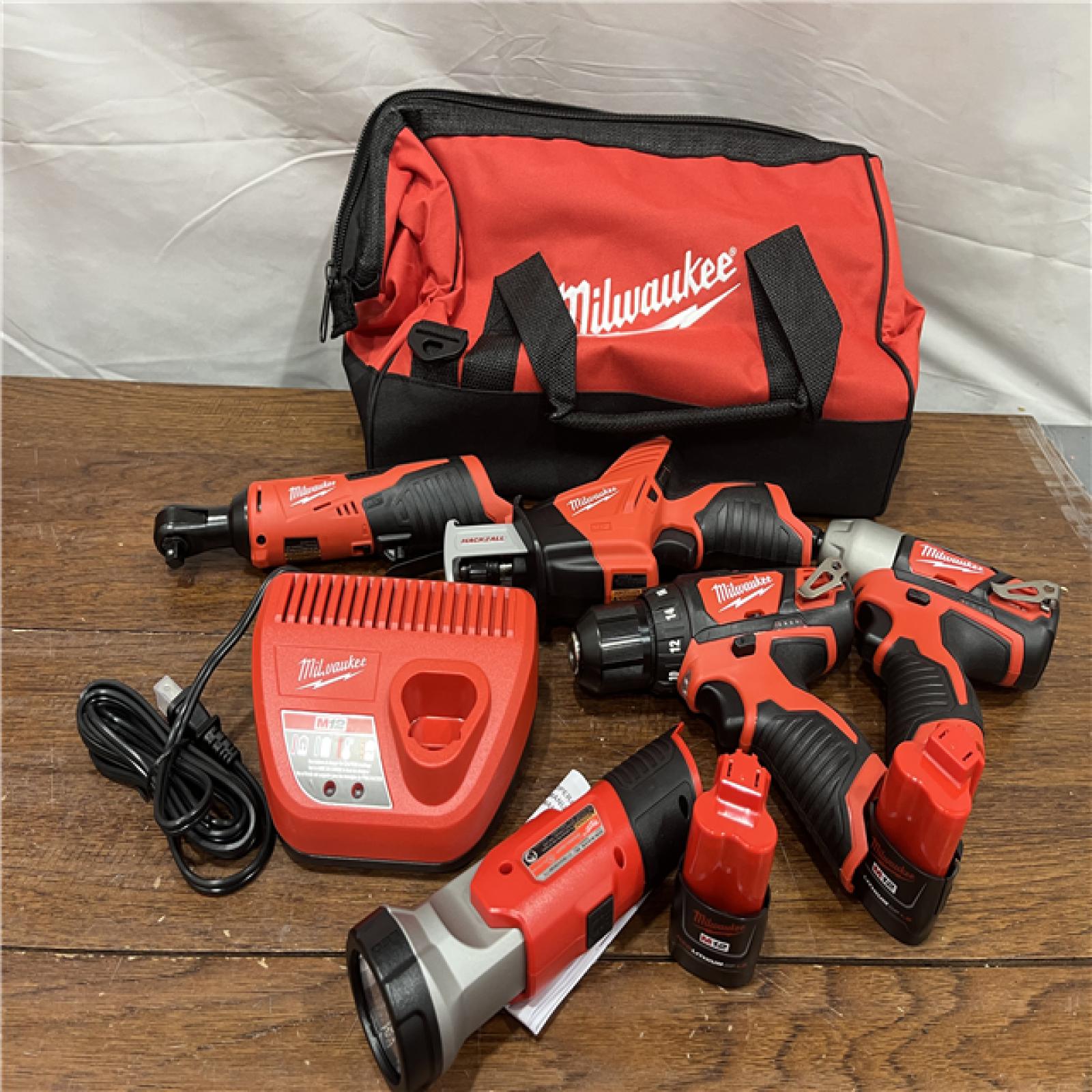 AS-IS MILWAUKEE M12 12V Lithium-Ion Cordless Combo Kit (5-Tool) with Two 1.5Ah Batteries, Charger & Tool Bag