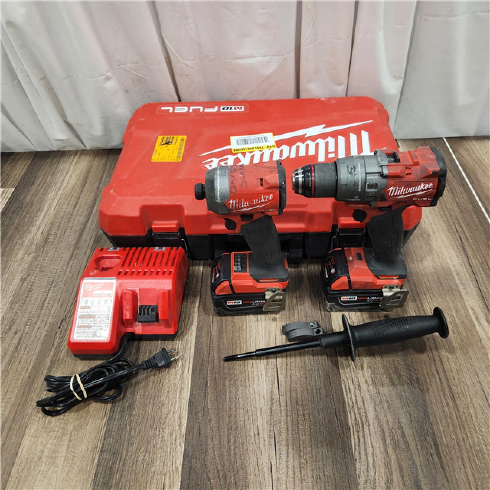 AS IS Milwaukee M18 FUEL 18V Lithium-Ion Brushless Cordless Hammer Drill and Impact Driver Combo Kit (2-Tool) with 2 Batteries