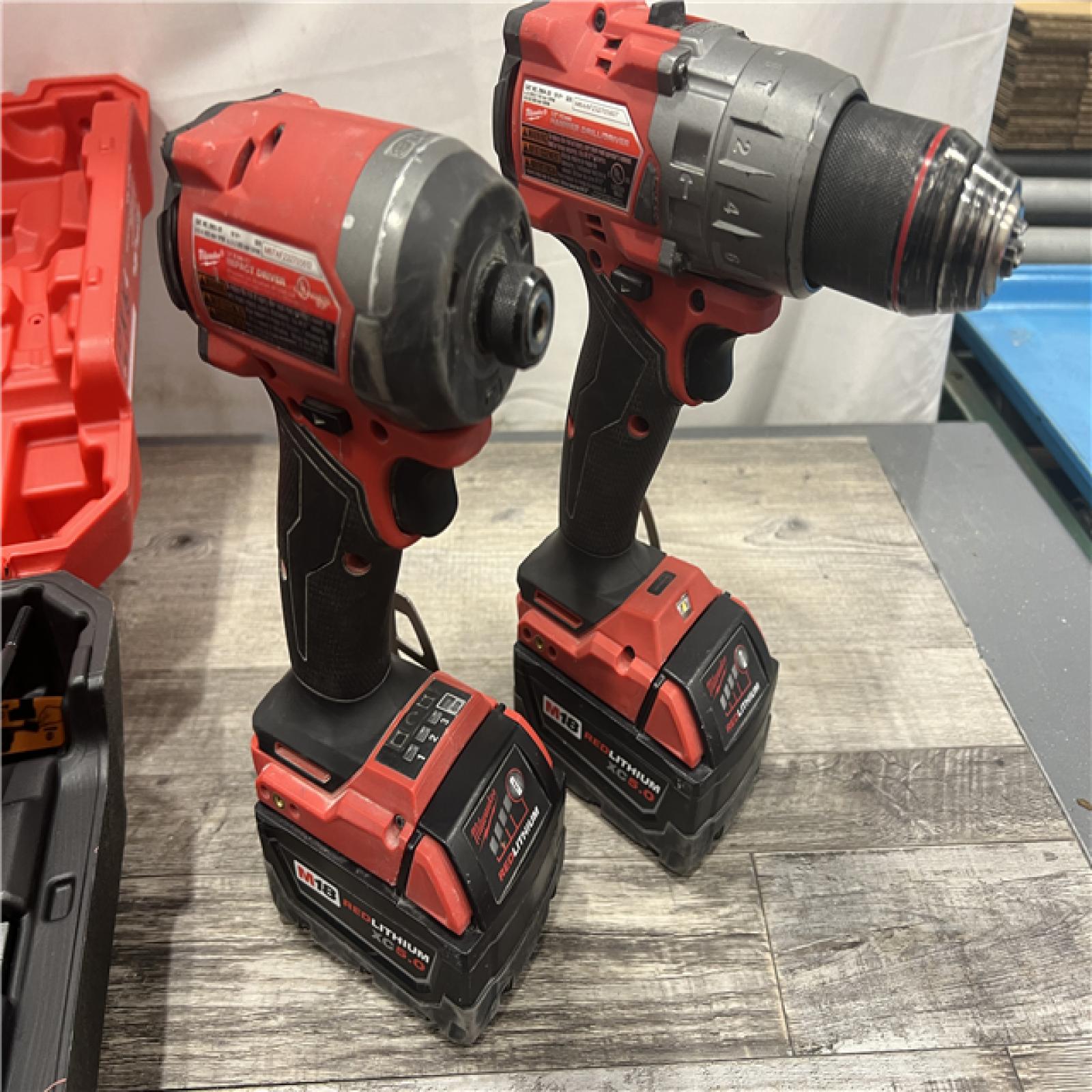 AS-IS MILWAUKEE M18 FUEL 18V Lithium-Ion Brushless Cordless Hammer Drill and Impact Driver Combo Kit (2-Tool) with 2 Batteries