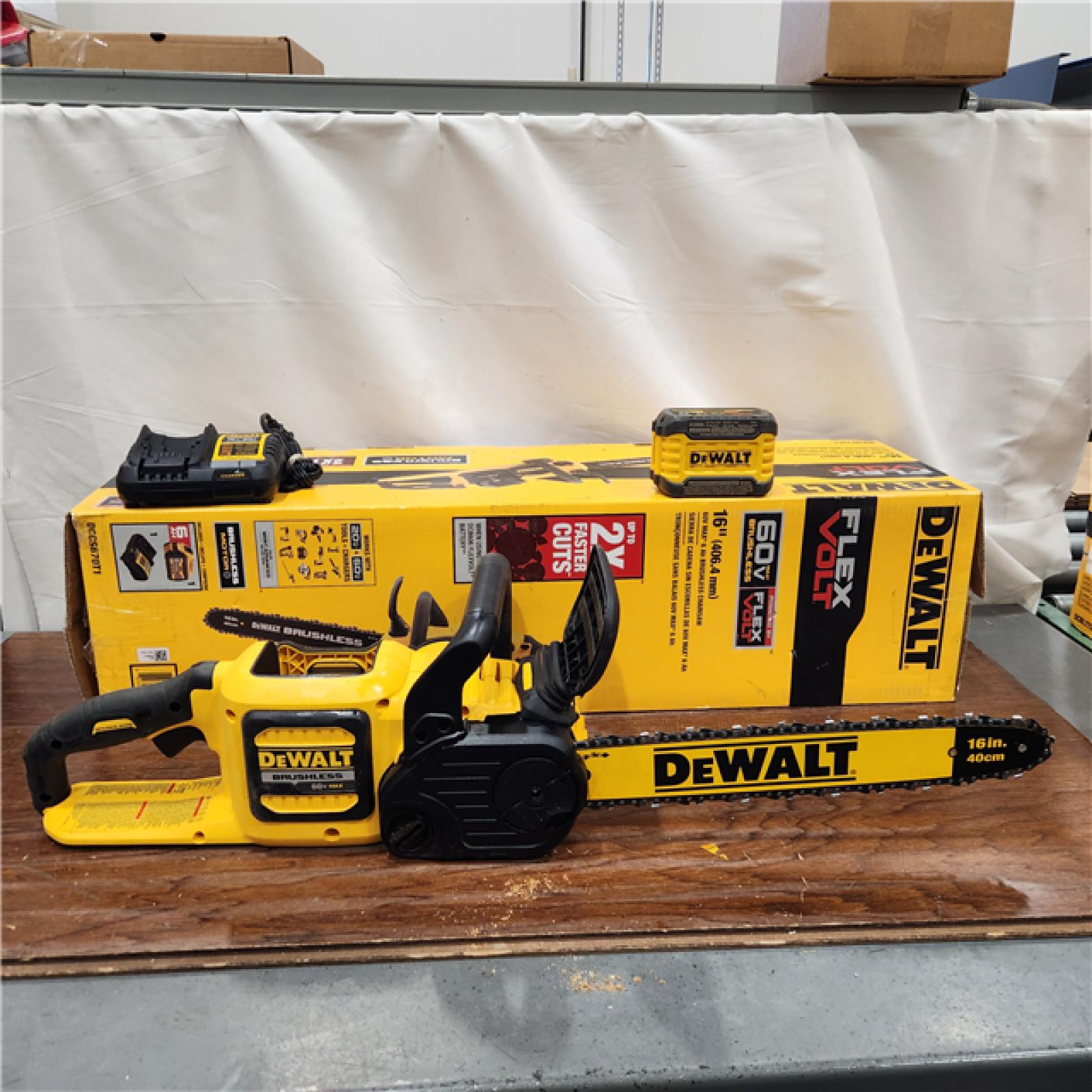 AS-IS DEWALT  FLEXVOLT 60V MAX 16in. Brushless Cordless Battery Powered Chainsaw Kit with (1) FLEXVOLT 2 Ah Battery & Charger