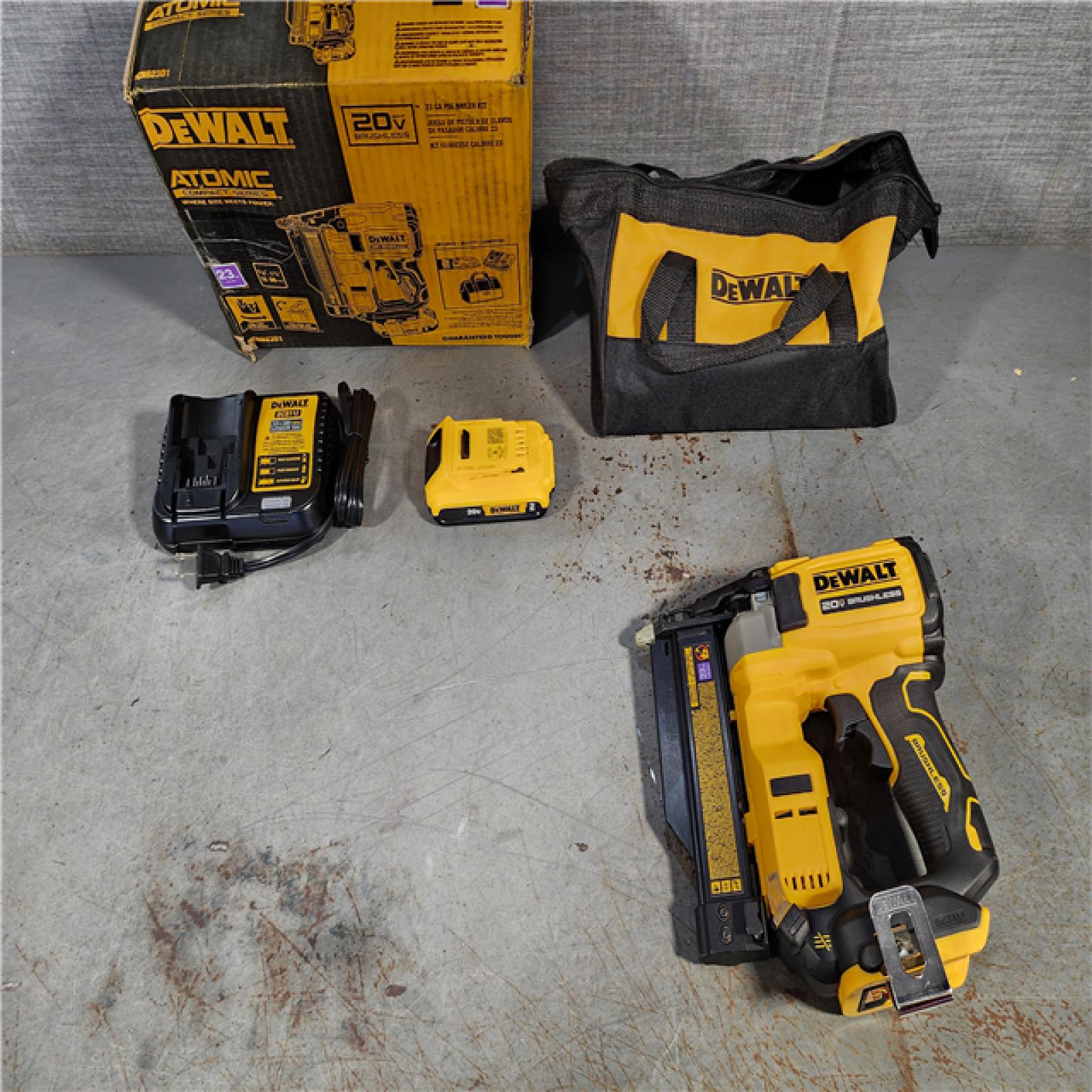 HOUSTON LOCATION - AS-IS DEWALT ATOMIC 20V MAX Lithium Ion Cordless 23 Gauge Pin Nailer Kit with 2.0Ah Battery and Charger