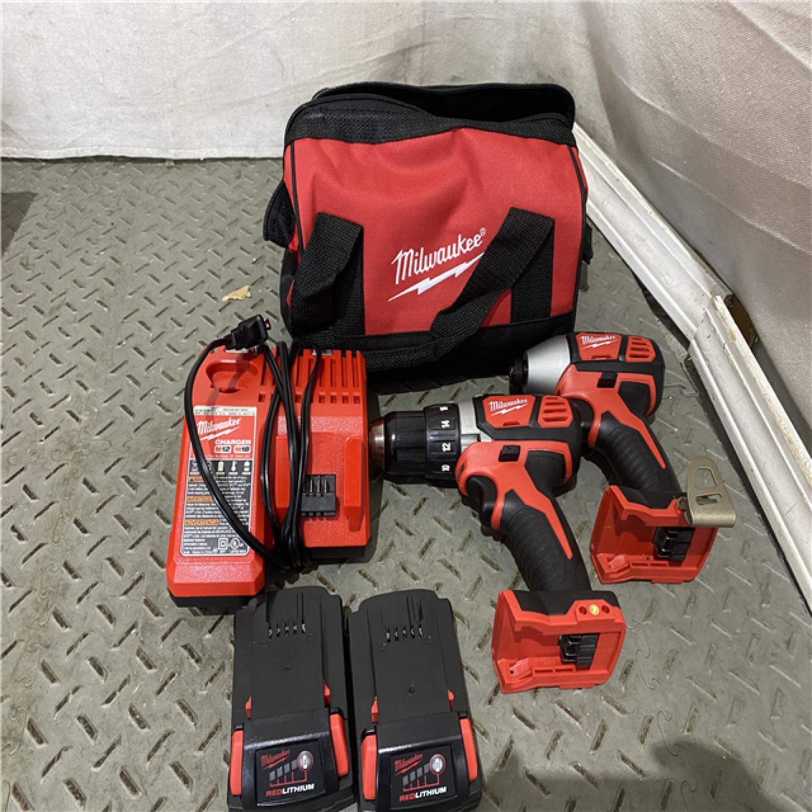 Houston location AS-IS  Milwaukee Electric Tools 2691-22 MILWAUKEE M18 COMBO KITS LIKE NEW