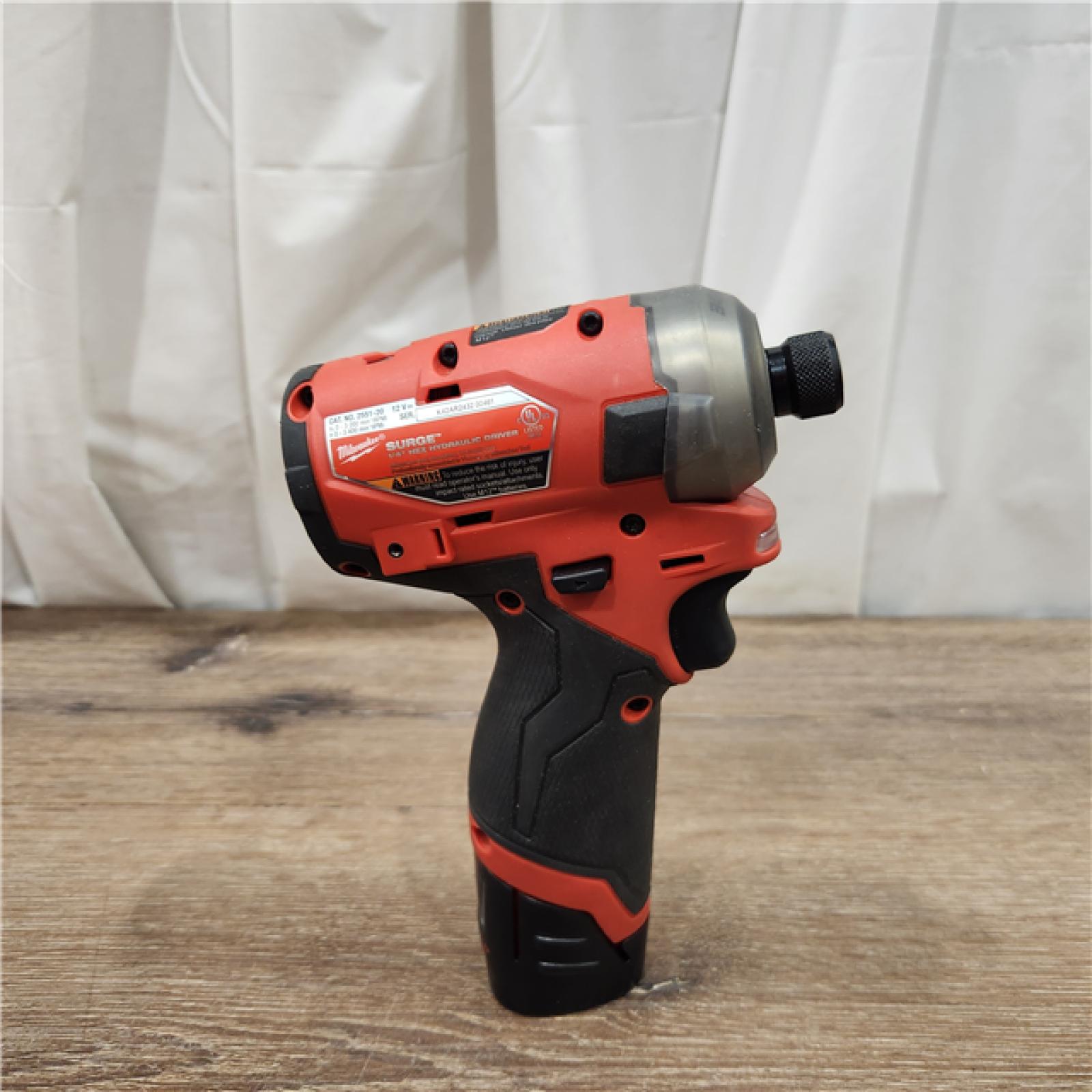 AS-IS M12 FUEL SURGE 12V Lithium-Ion Brushless Cordless 1/4 in. Hex Impact Driver Compact Kit W/Two 2.0Ah Batteries, Bag