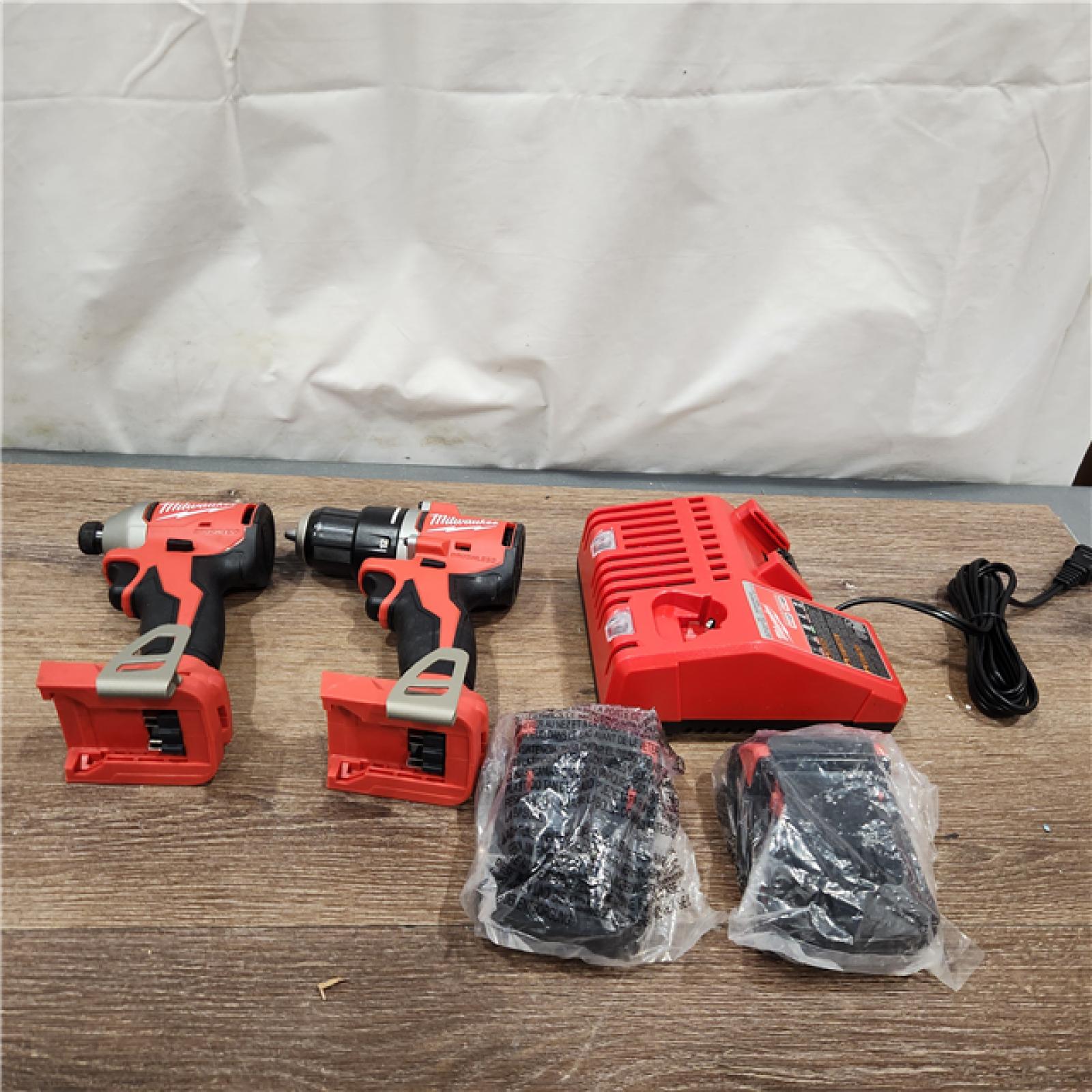 AS-IS Milwaukee M18 Compact Brushless 2-Tool Combo Kit