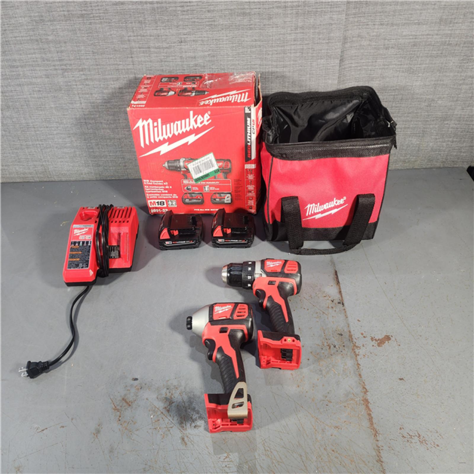 HOUSTON LOCATION - AS-IS Milwaukee M18 Brushed Cordless (2-Tool) Drill/Driver and Impact Driver Kit