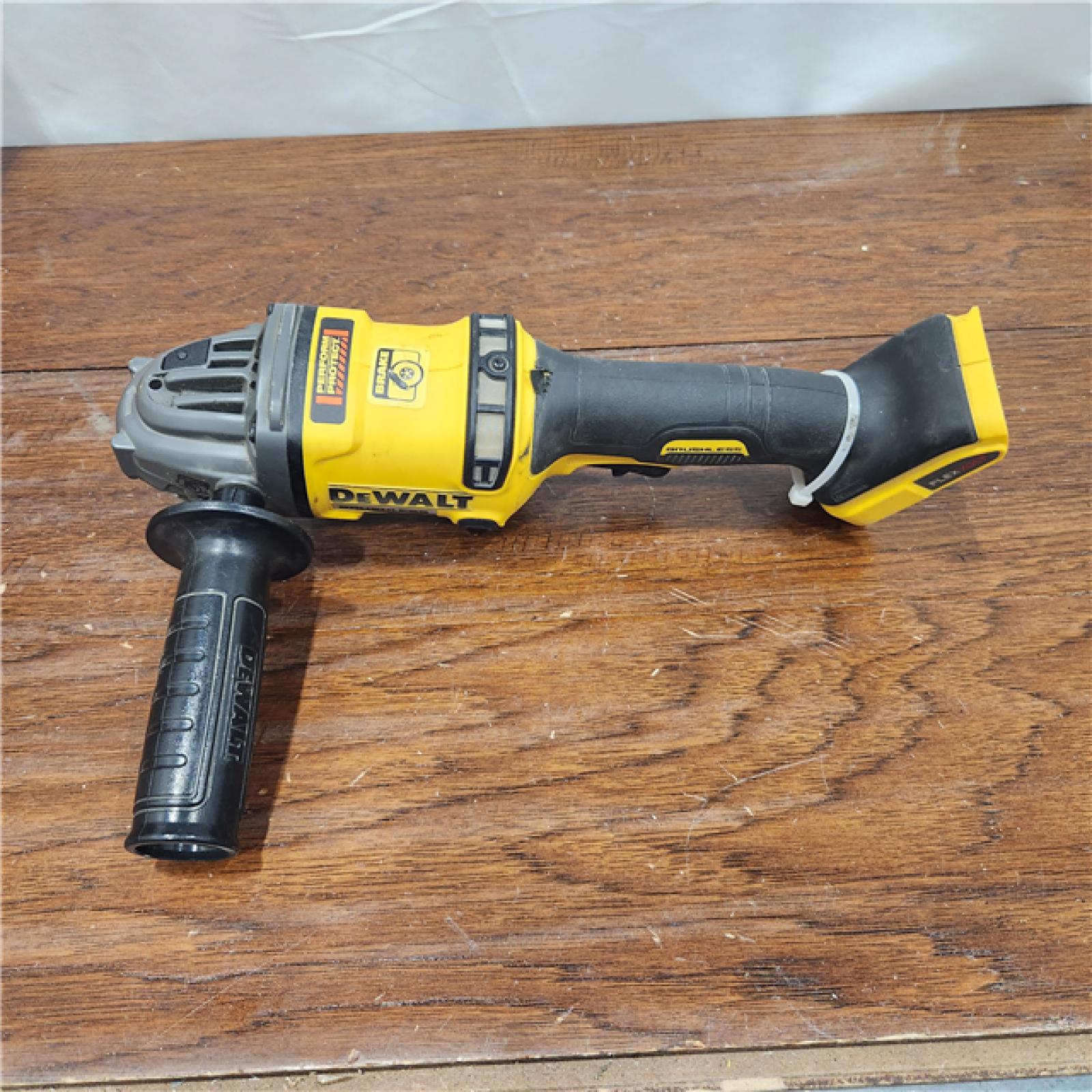 AS-IS Dewalt FLEXVOLT 60-Volt MAX Lithium-Ion Cordless Brushless 4-1/2 in. Angle Grinder with Kickback Brake (Tool-Only)