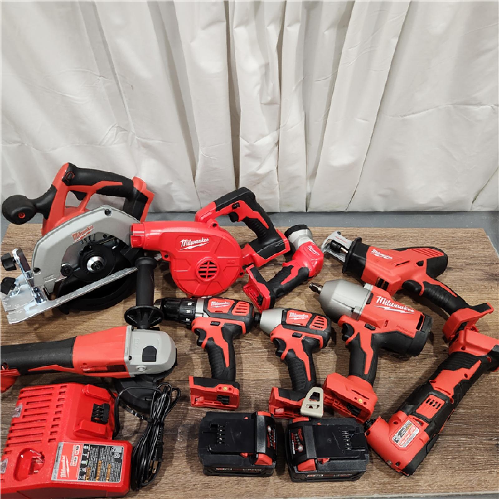 AS-IS M18 18-Volt Lithium-Ion Cordless Combo Kit (9-Tool) with (2) Batteries, Charger, and Tool Bag