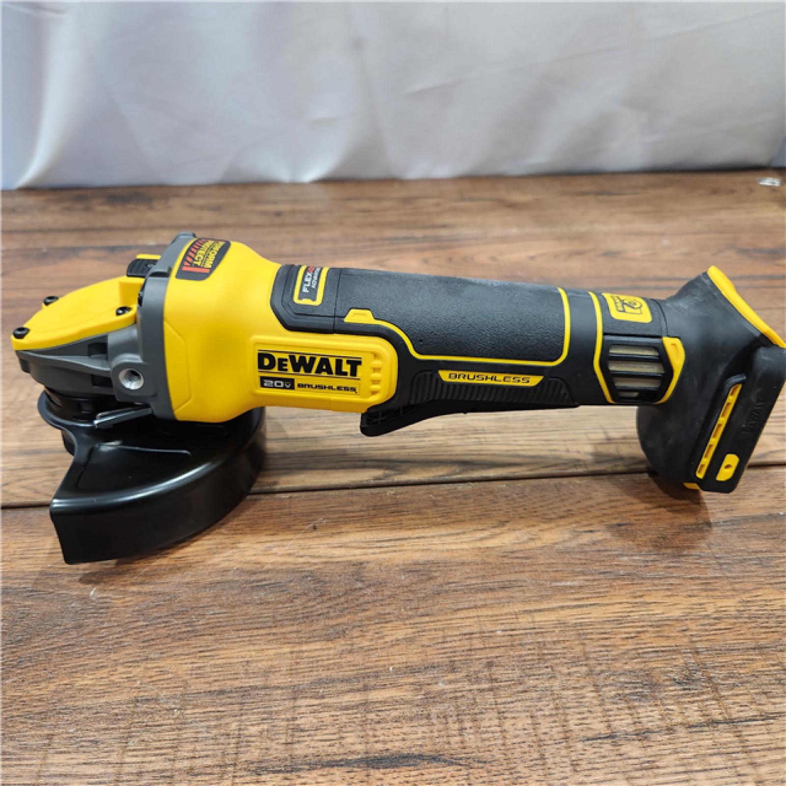 AS-IS 20V MAX Cordless Brushless 4.5 - 5 in. Paddle Switch Angle Grinder with FLEXVOLT ADVANTAGE (Tool Only)