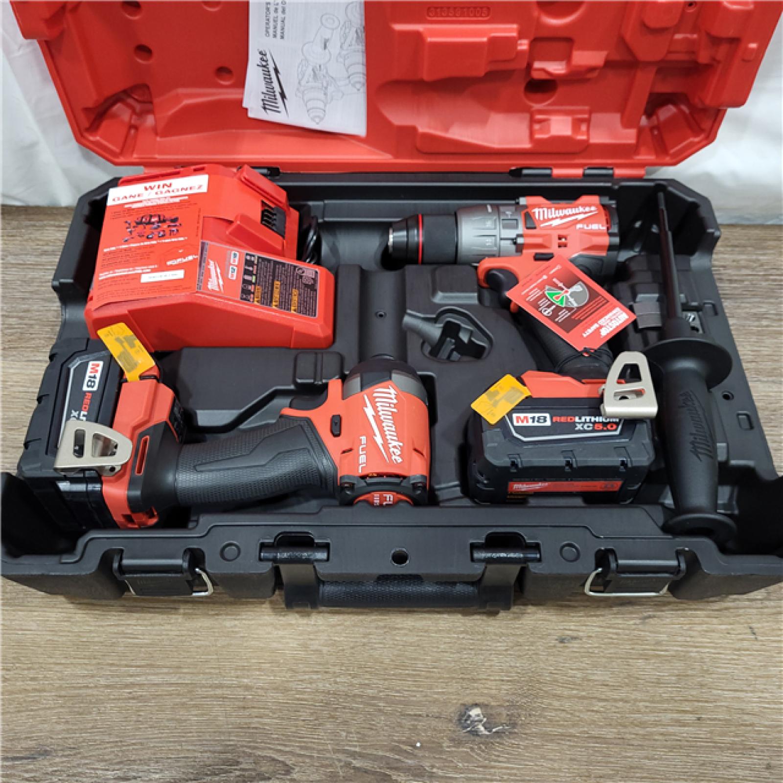 AS-IS M18 FUEL 18V Lithium-Ion Brushless Cordless Hammer Drill and Impact Driver Combo Kit (2-Tool) with 2 Batteries