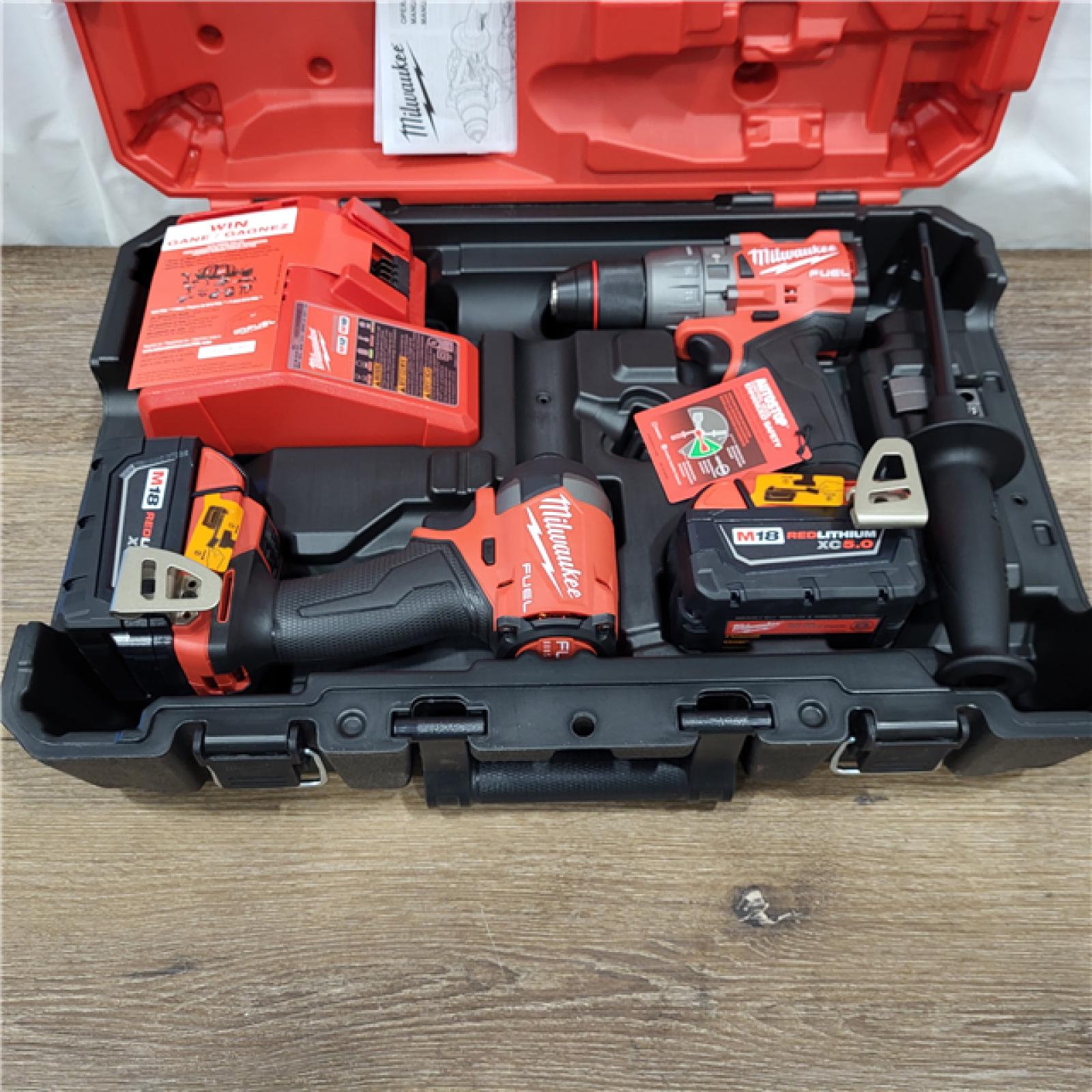 AS-IS M18 FUEL 18V Lithium-Ion Brushless Cordless Hammer Drill and Impact Driver Combo Kit (2-Tool) with 2 Batteries