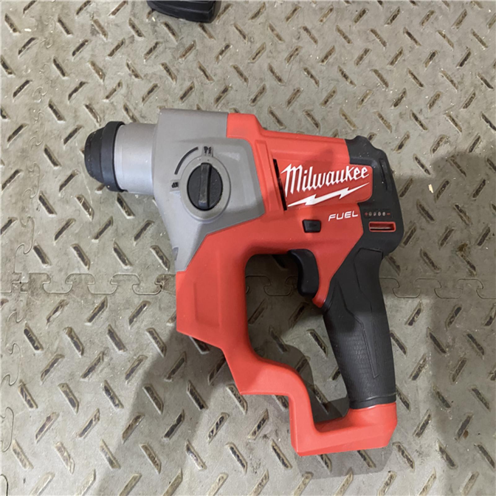 Houston location AS-IS MILWAUKEE M12 FUEL 12V Lithium-Ion Brushless Cordless 5/8 in. SDS-Plus Rotary Hammer Kit with One 4.0Ah Battery and Bag