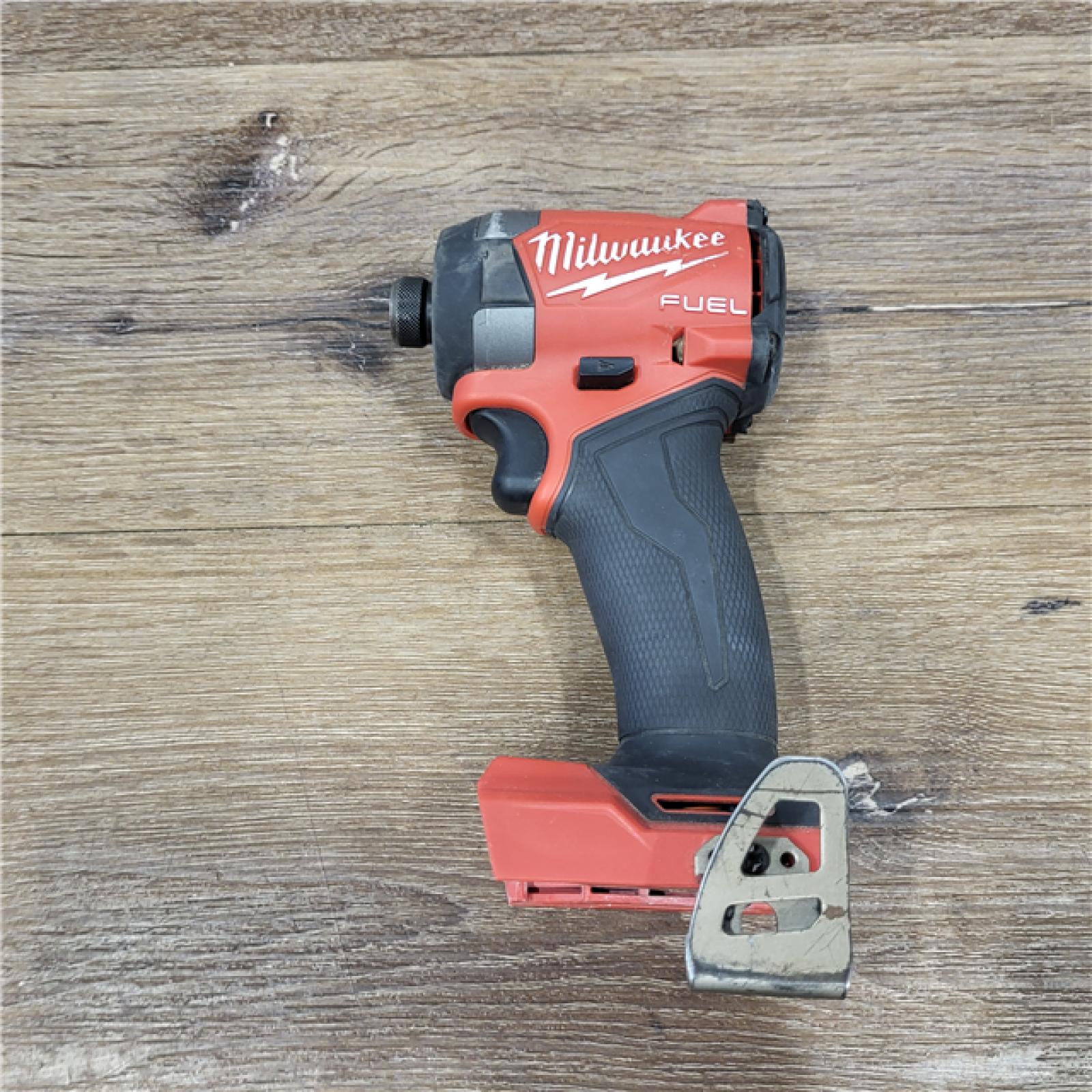 AS-IS Milwaukee 2953-20 18V Lithium-Ion Brushless Cordless 1/4   Hex Impact Driver Bare Tool  Red